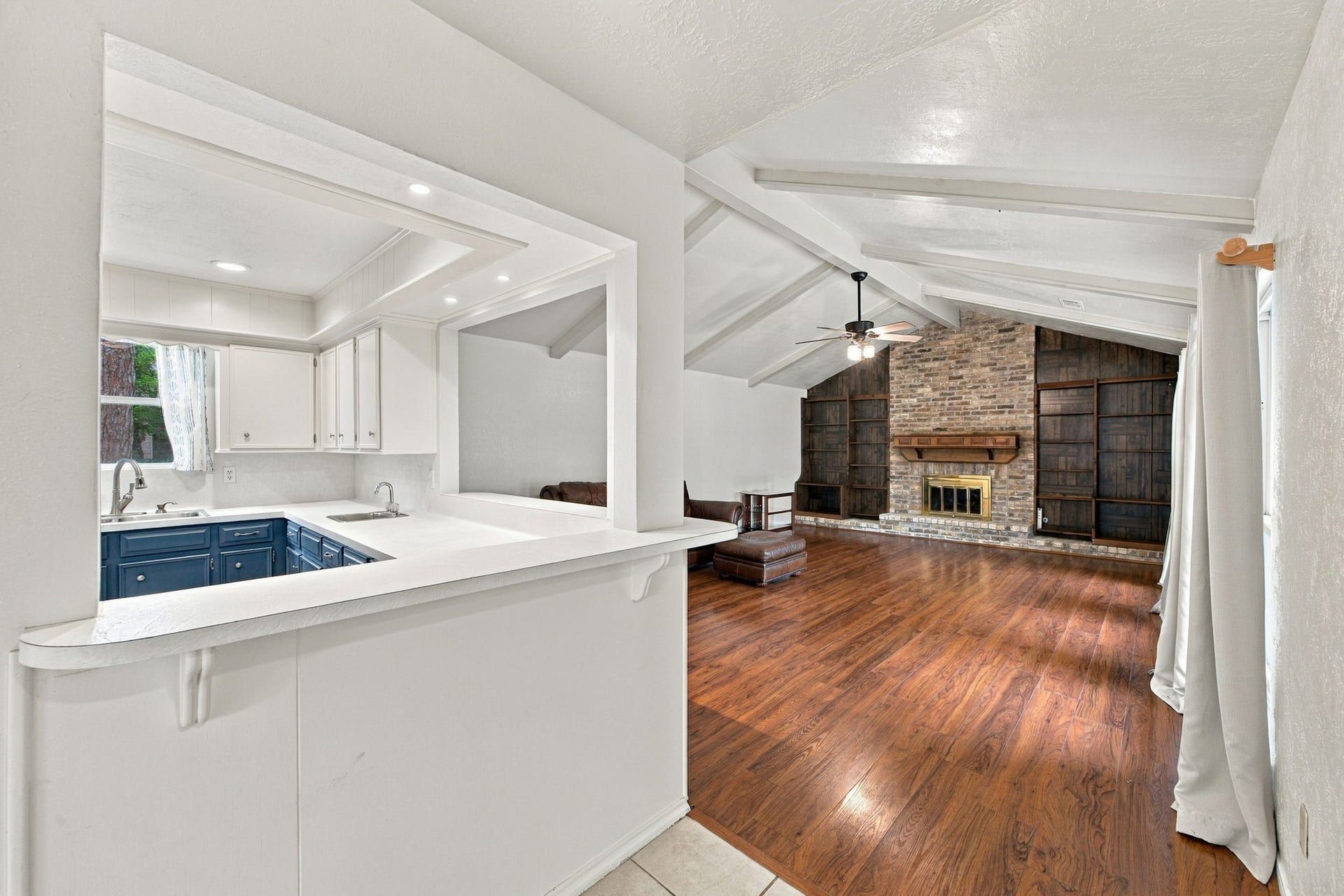 8902 Rocky Lane, Houston, TX 77040 The open floor plan has living area to one side and the sleeping quarters to the other.