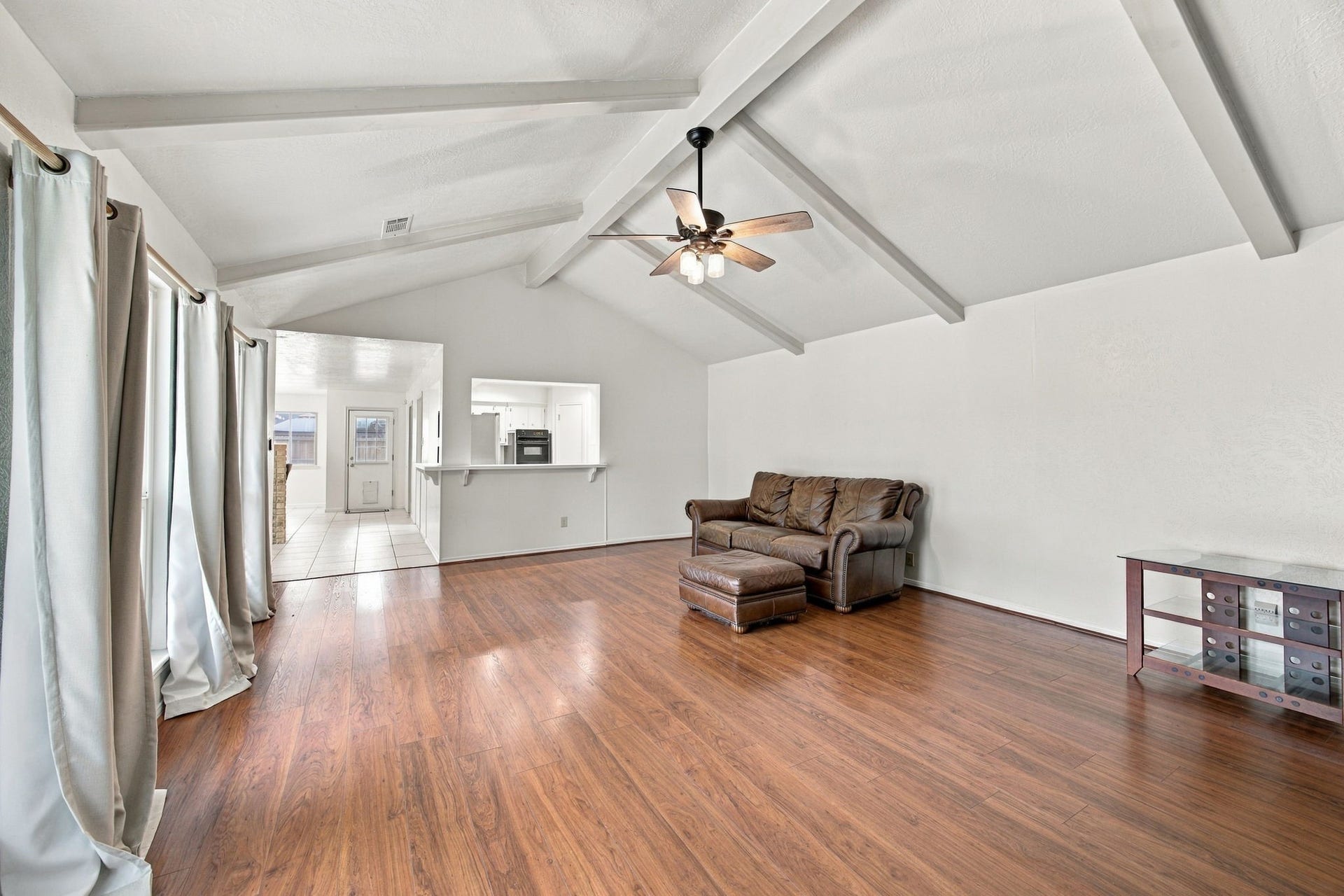 8902 Rocky Lane, Houston, TX 77040 This large open living area has plenty of room for even the largest sectional. You could even split the room into a seating area as well.