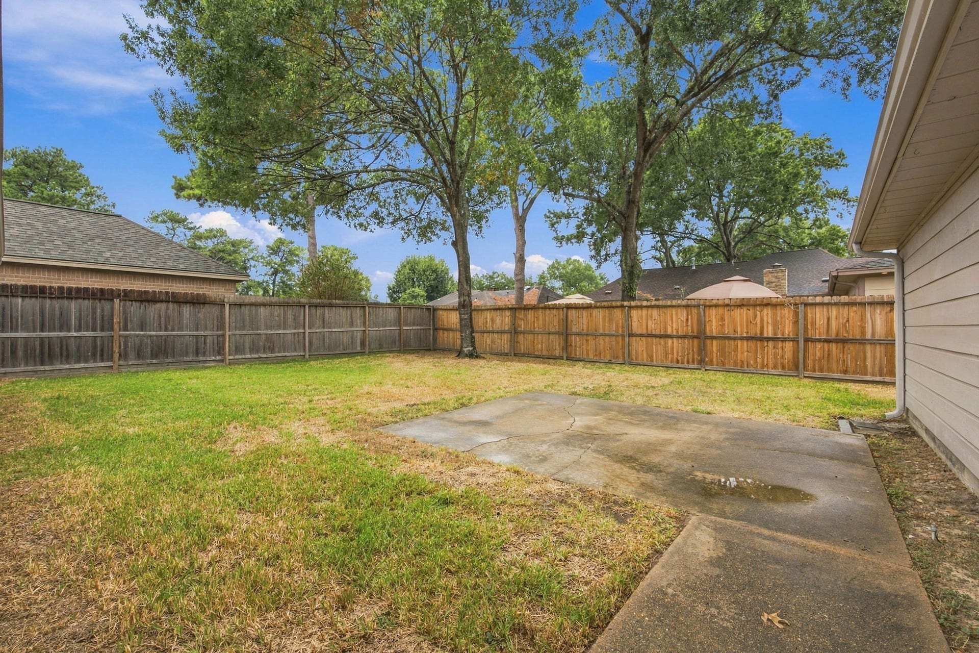8902 Rocky Lane, Houston, TX 77040 The back yard is wide open and ready for your ideas