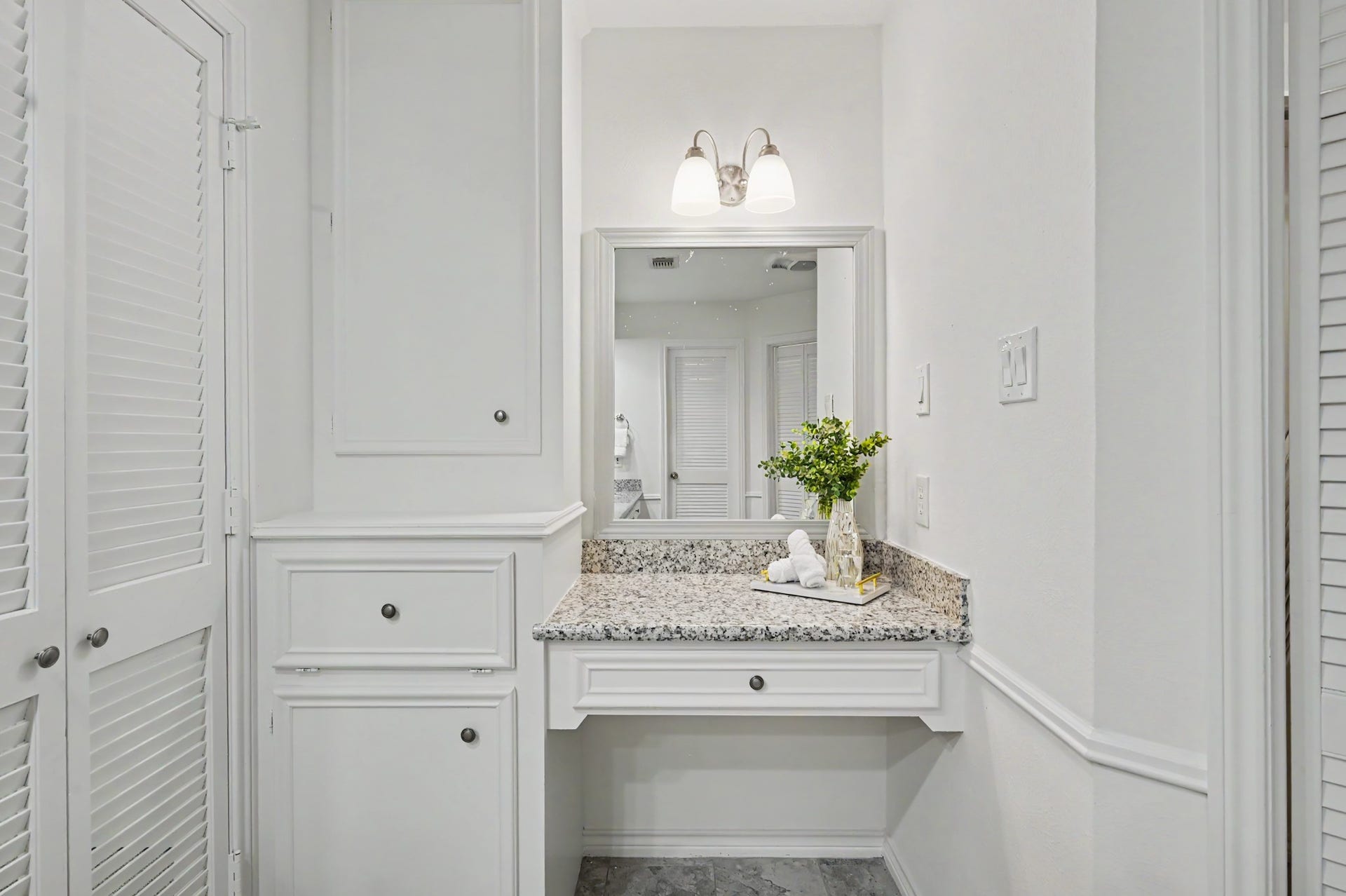 19 Postvine Court, The Woodlands, TX 77381 Vanity with storage space.