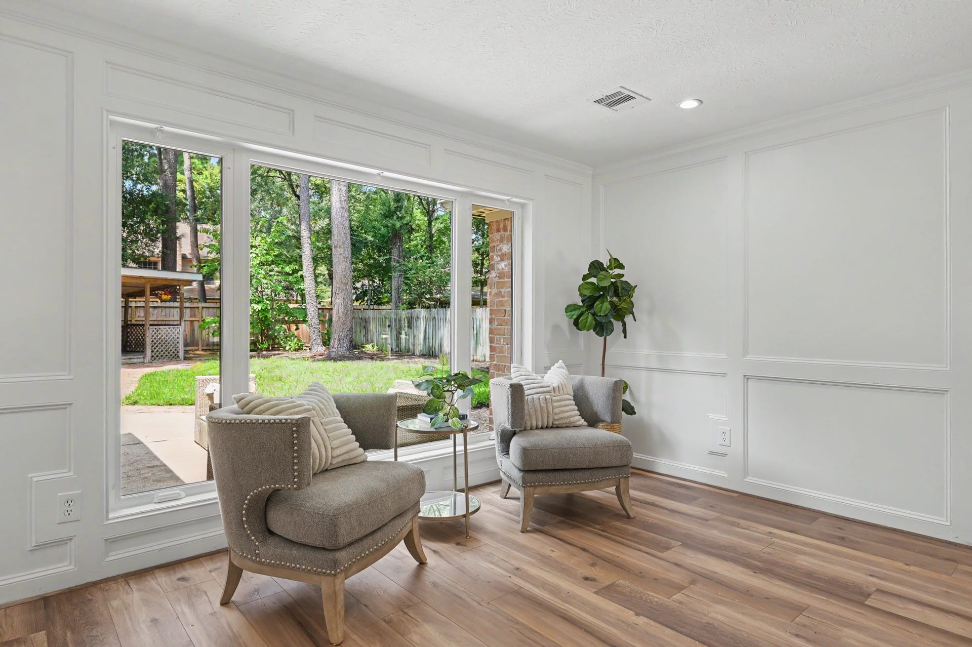 19 Postvine Court, The Woodlands, TX 77381 New windows bring the natural light into the living area.