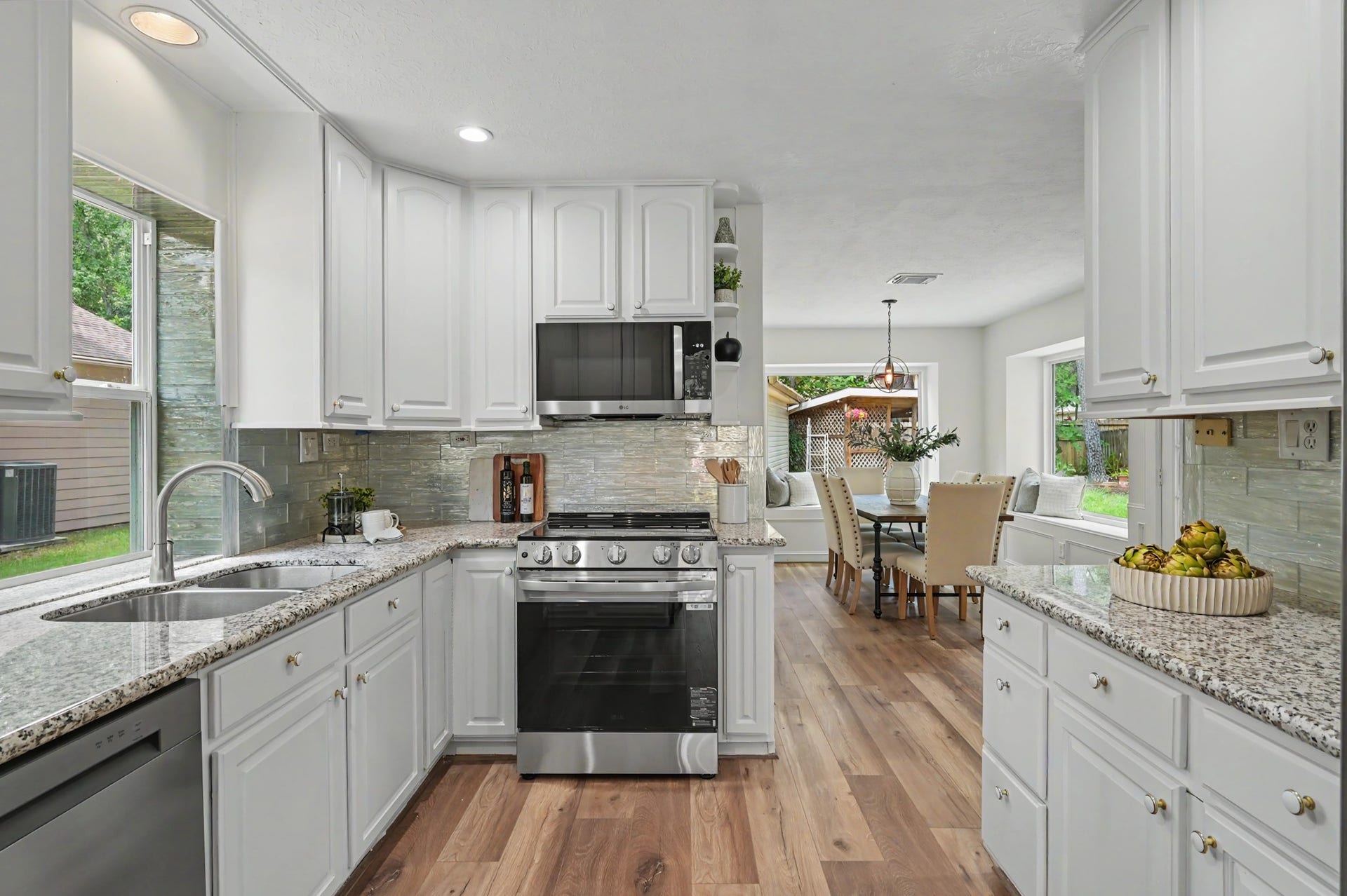 19 Postvine Court, The Woodlands, TX 77381 Kitchen features ALL NEW appliances.