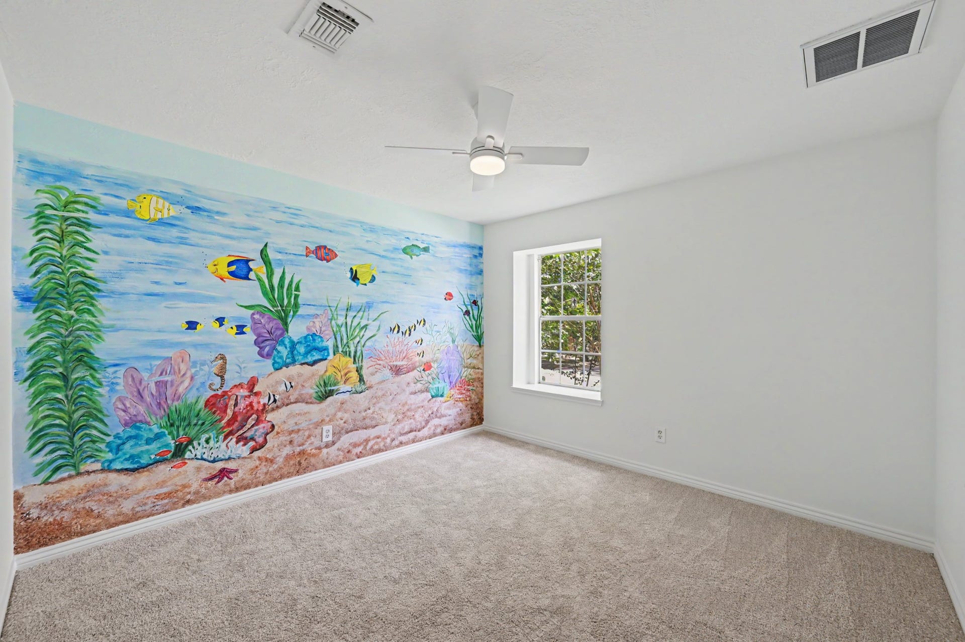 19 Postvine Court, The Woodlands, TX 77381 Secondary bedroom #2. New carpet, fresh paint & new ceiling fan with light fixture.