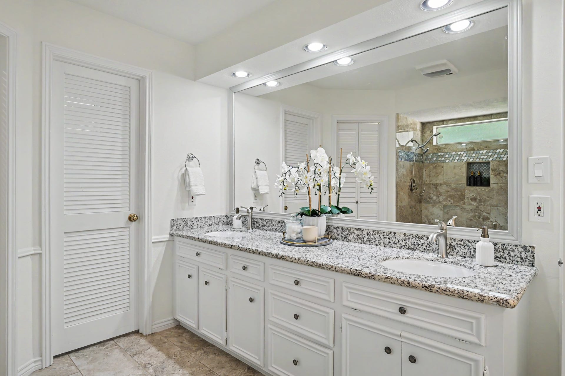 19 Postvine Court, The Woodlands, TX 77381 Updated vanity with ample storage space.