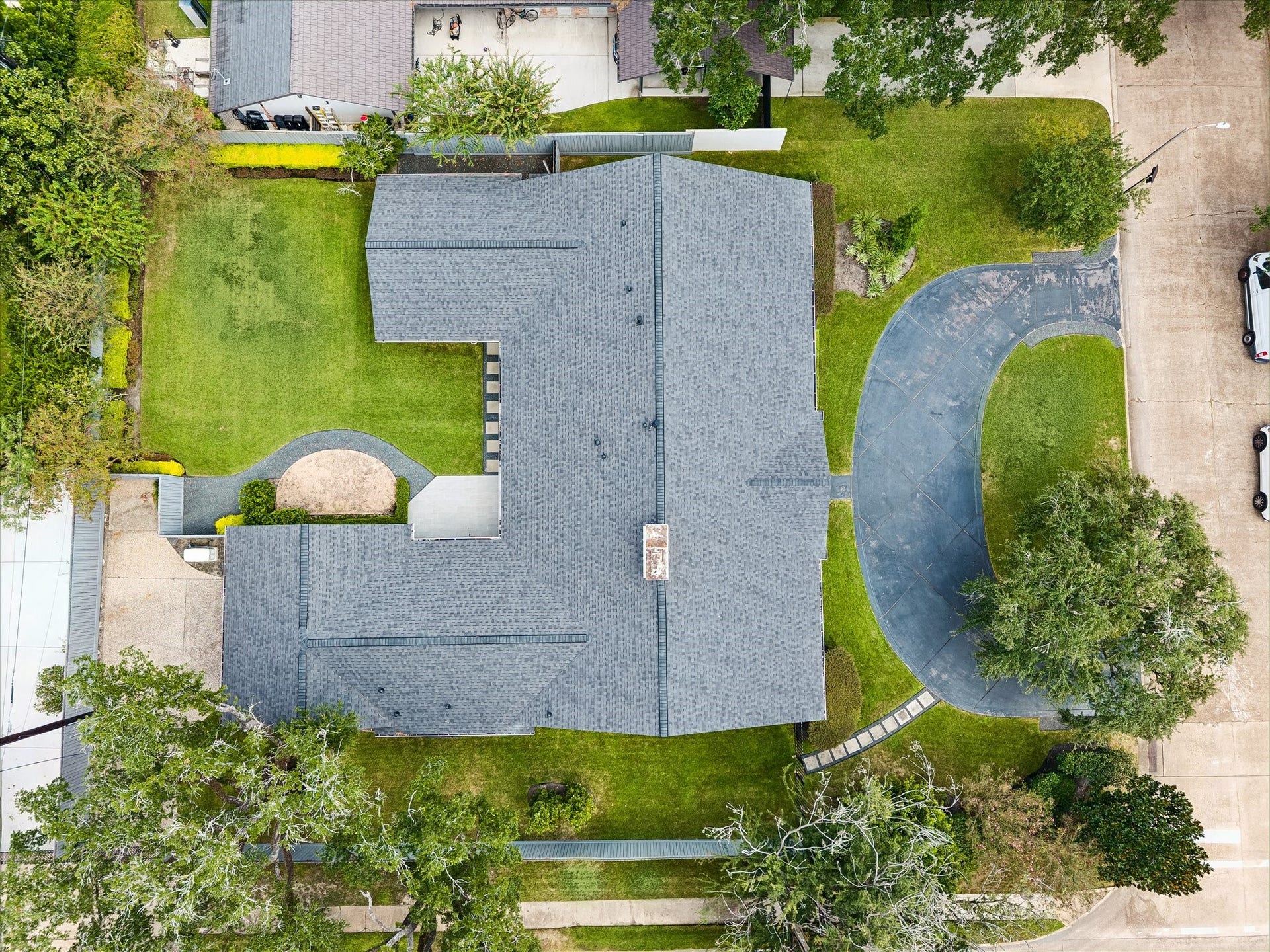 Aerial view of this gracious Tanglewood home and its expansive 16,521-square-foot corner lot.