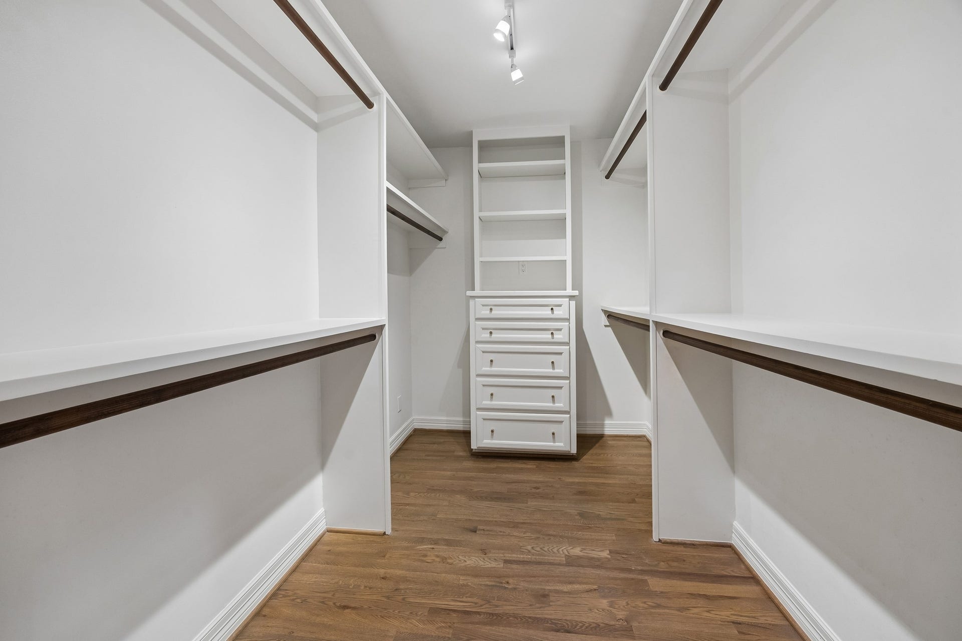 Second walk-in closet in primary suite.