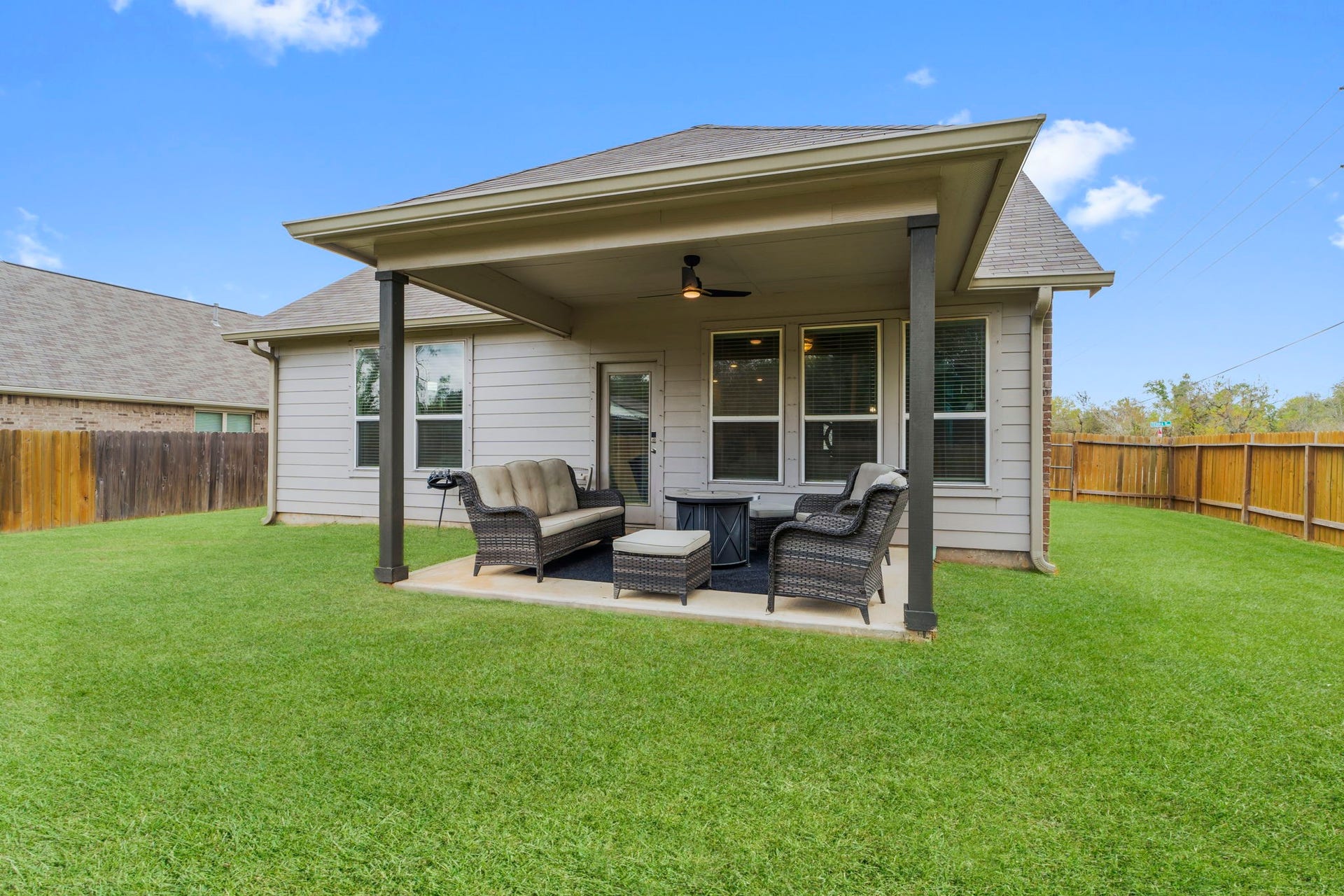 7054 Terra Drive, Manvel, TX 77578 Extended covered patio offering generous seating space.