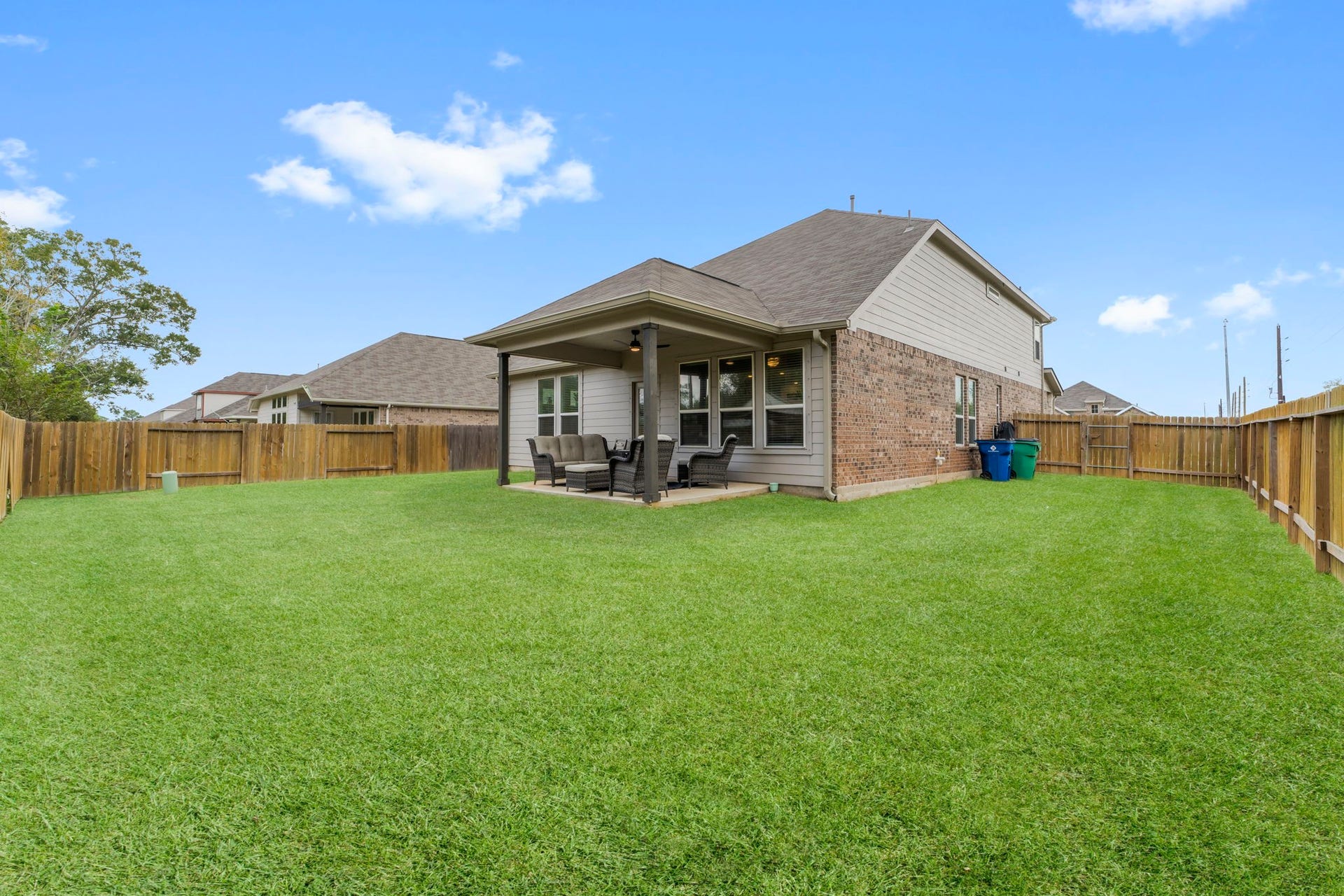 7054 Terra Drive, Manvel, TX 77578 Large fenced backyard with plenty of room for play or gardening.