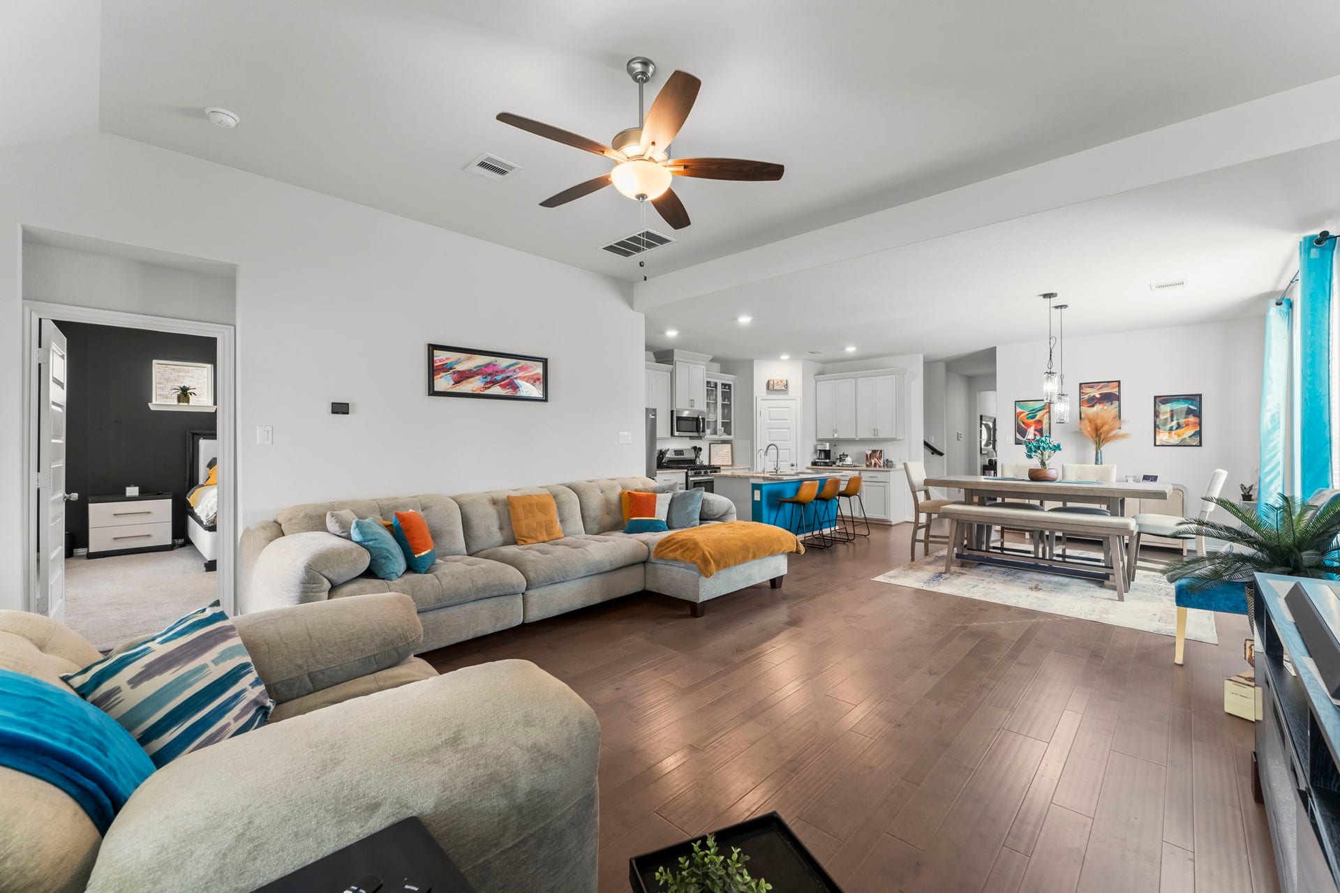 7054 Terra Drive, Manvel, TX 77578 Open-concept living area seamlessly connected to the kitchen and dining room.