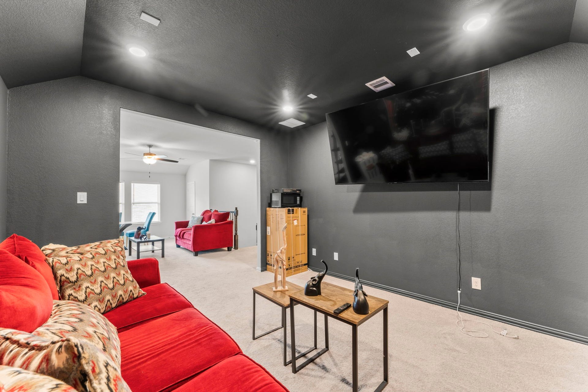 7054 Terra Drive, Manvel, TX 77578 Dedicated media room with dark walls for a true theater experience.