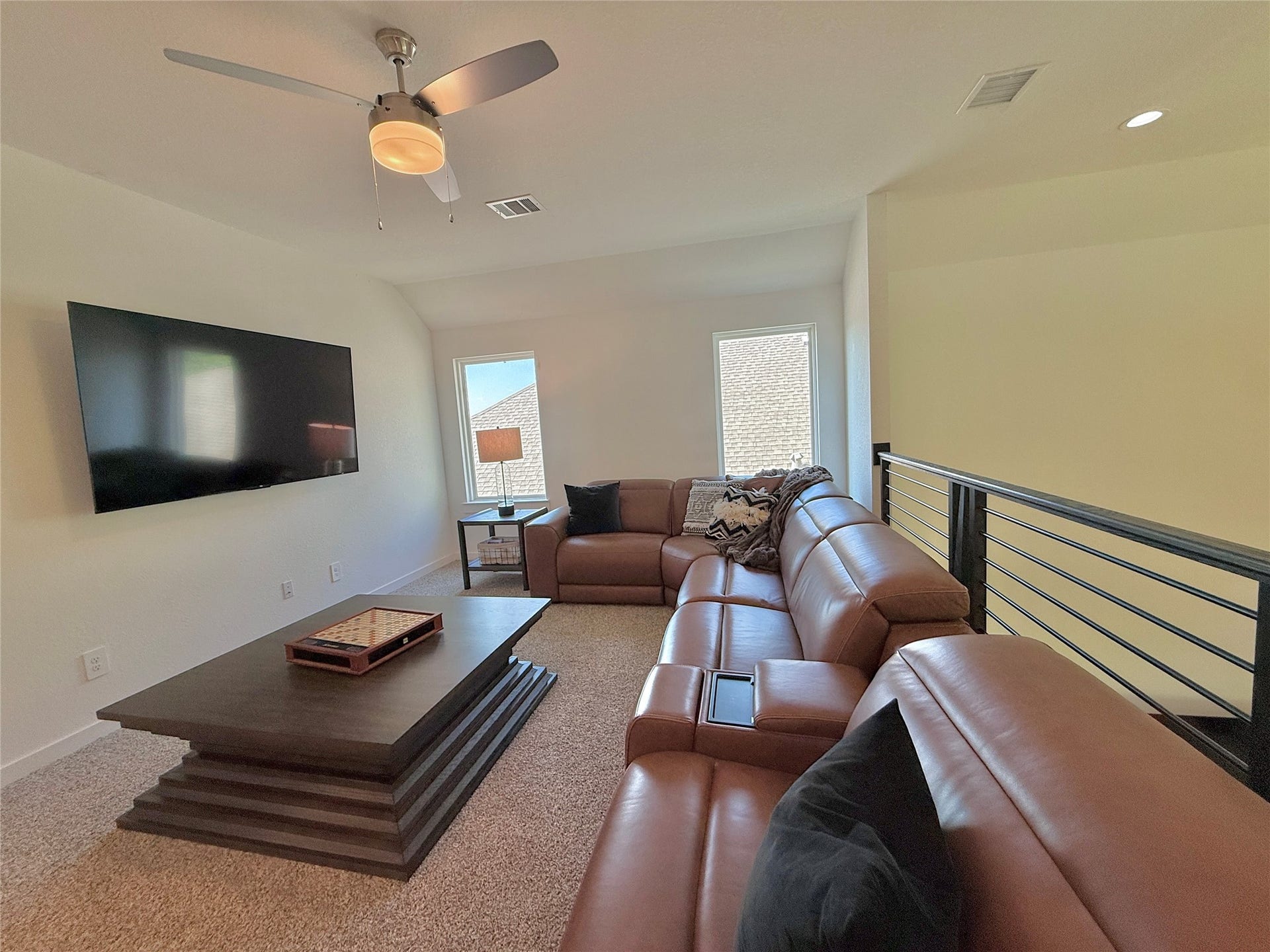 Spacious and inviting loft space perfect for playroom, game room or movie room