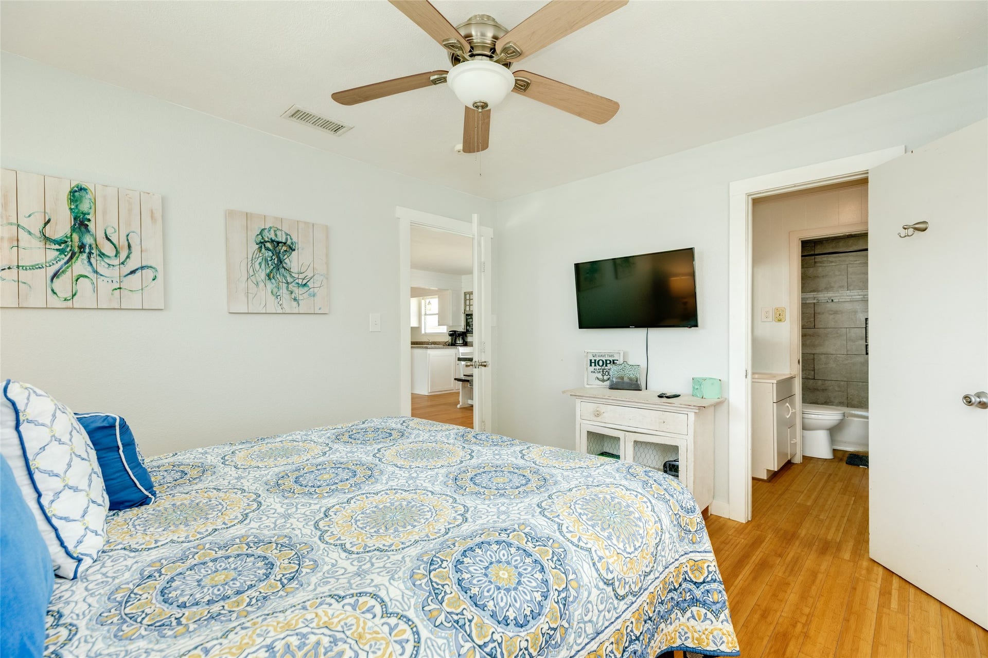 13103 John Reynolds Road, Galveston, TX 77554 Primary bedroom with updated en suite bath.