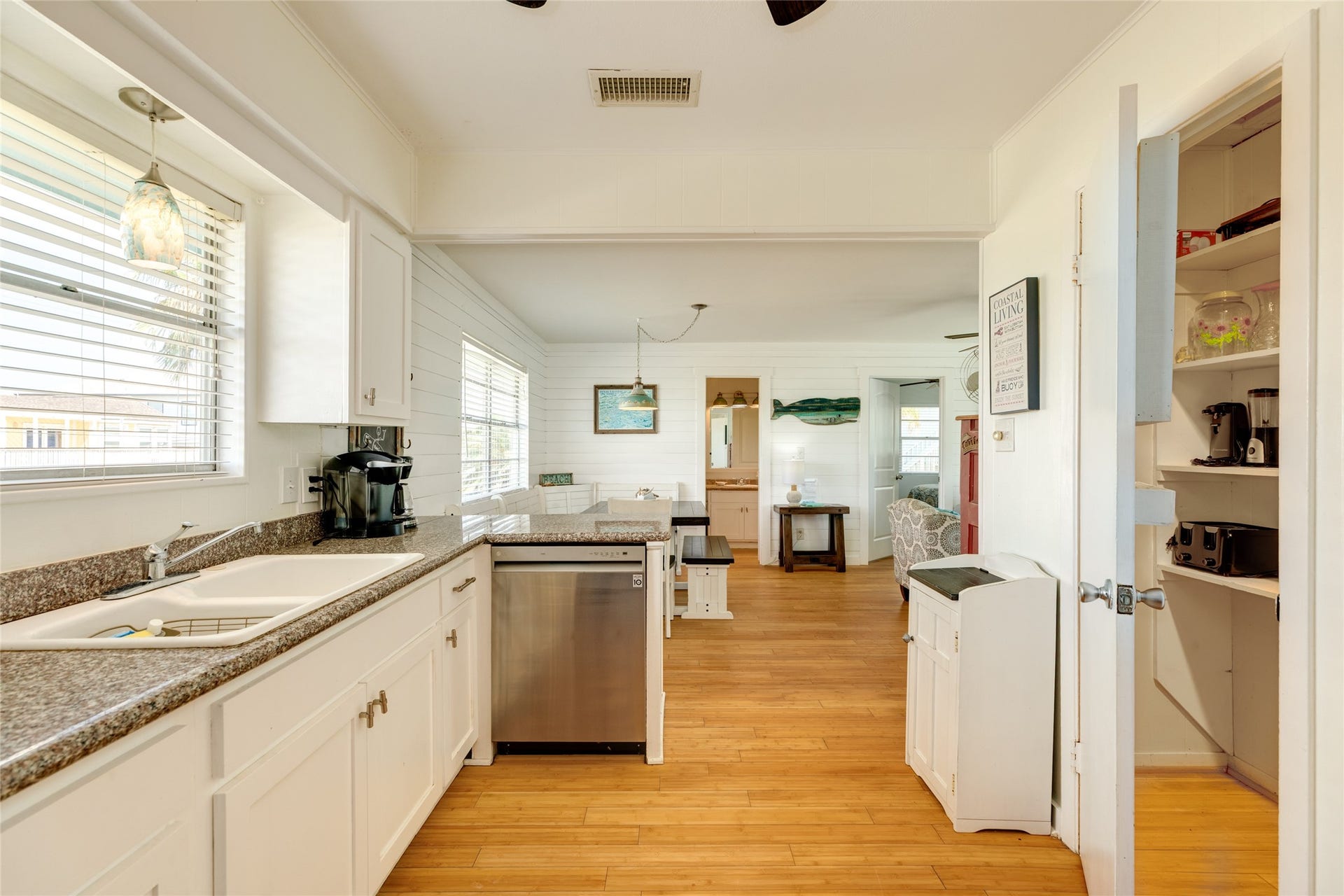 13103 John Reynolds Road, Galveston, TX 77554 Kitchen and dining space.