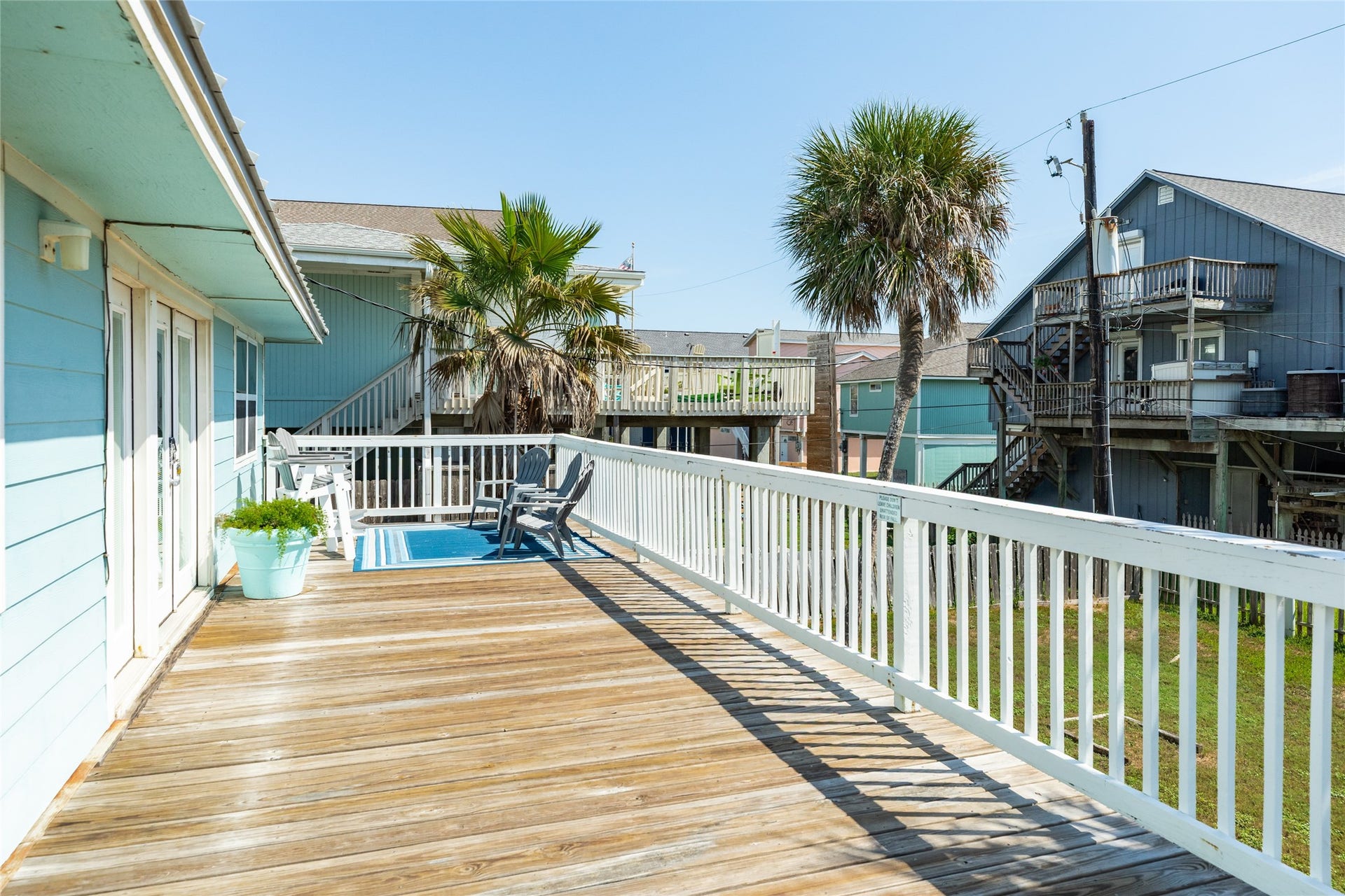 13103 John Reynolds Road, Galveston, TX 77554 Front deck to front door.