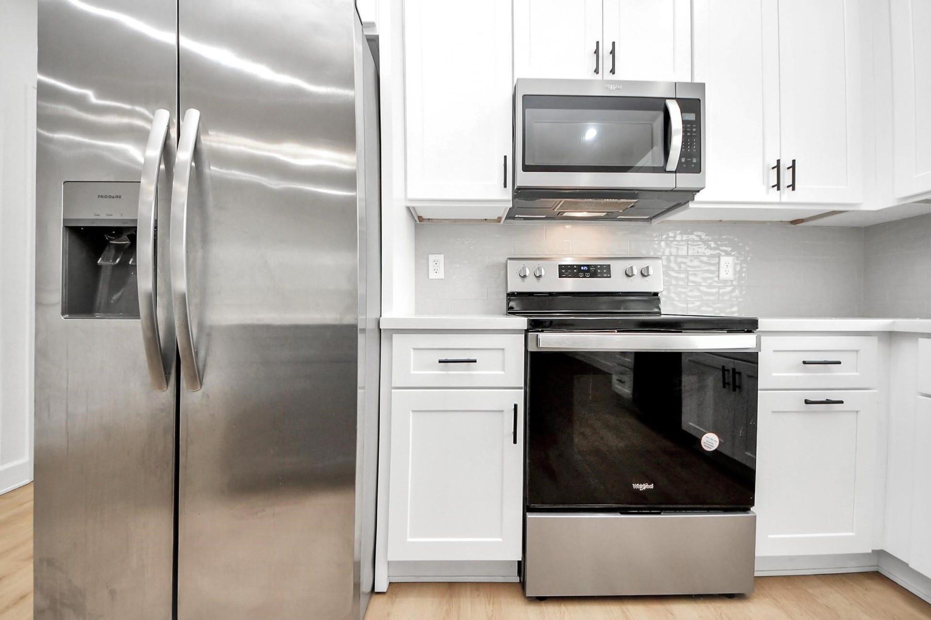8316 Corinth Street, #c, Houston, TX 77051 Stainless steel appliances pair perfectly with quartz counters and modern shaker cabinetry.