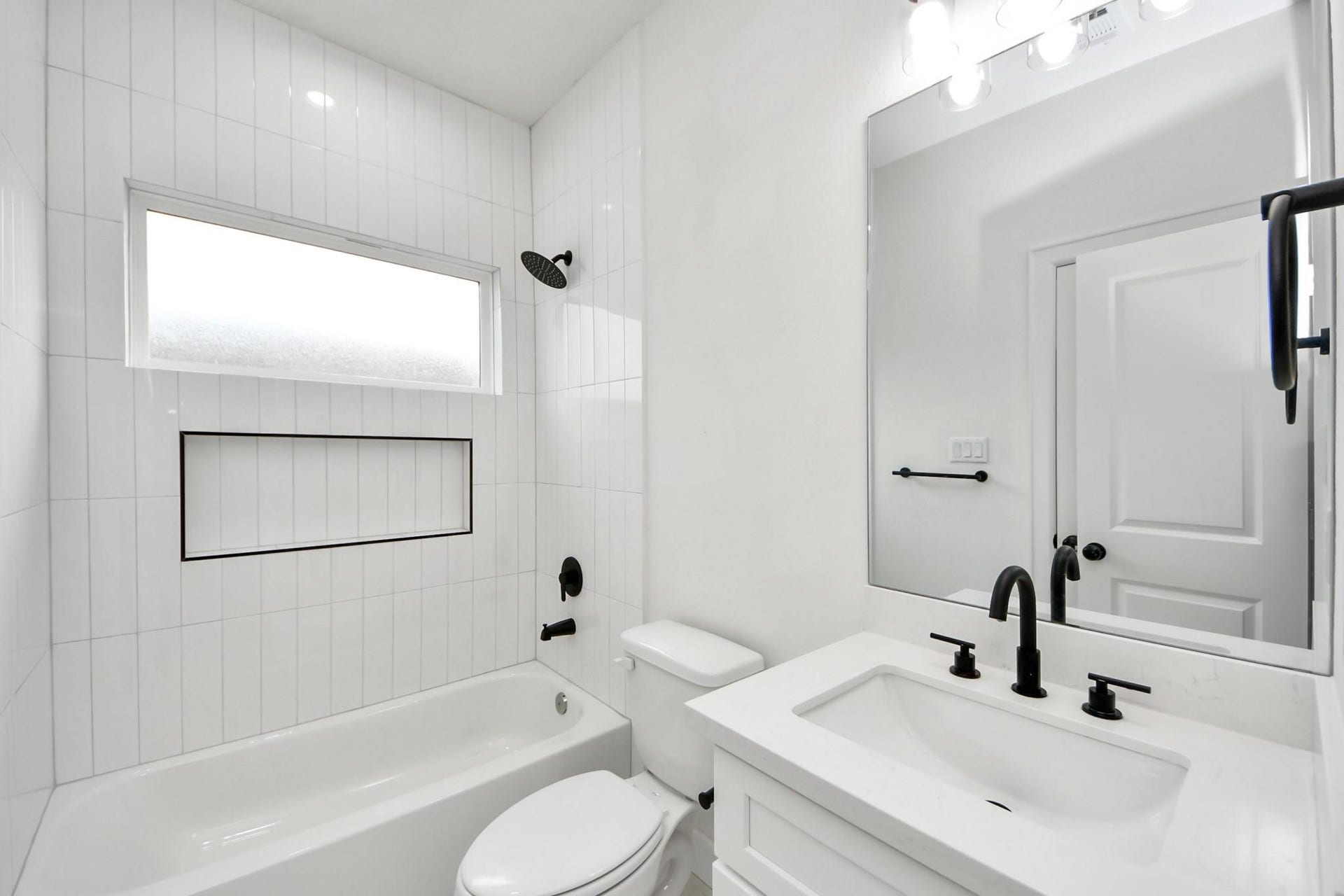 8316 Corinth Street, #c, Houston, TX 77051 Clean lines and durable quartz counters complement the homes modern aesthetic.