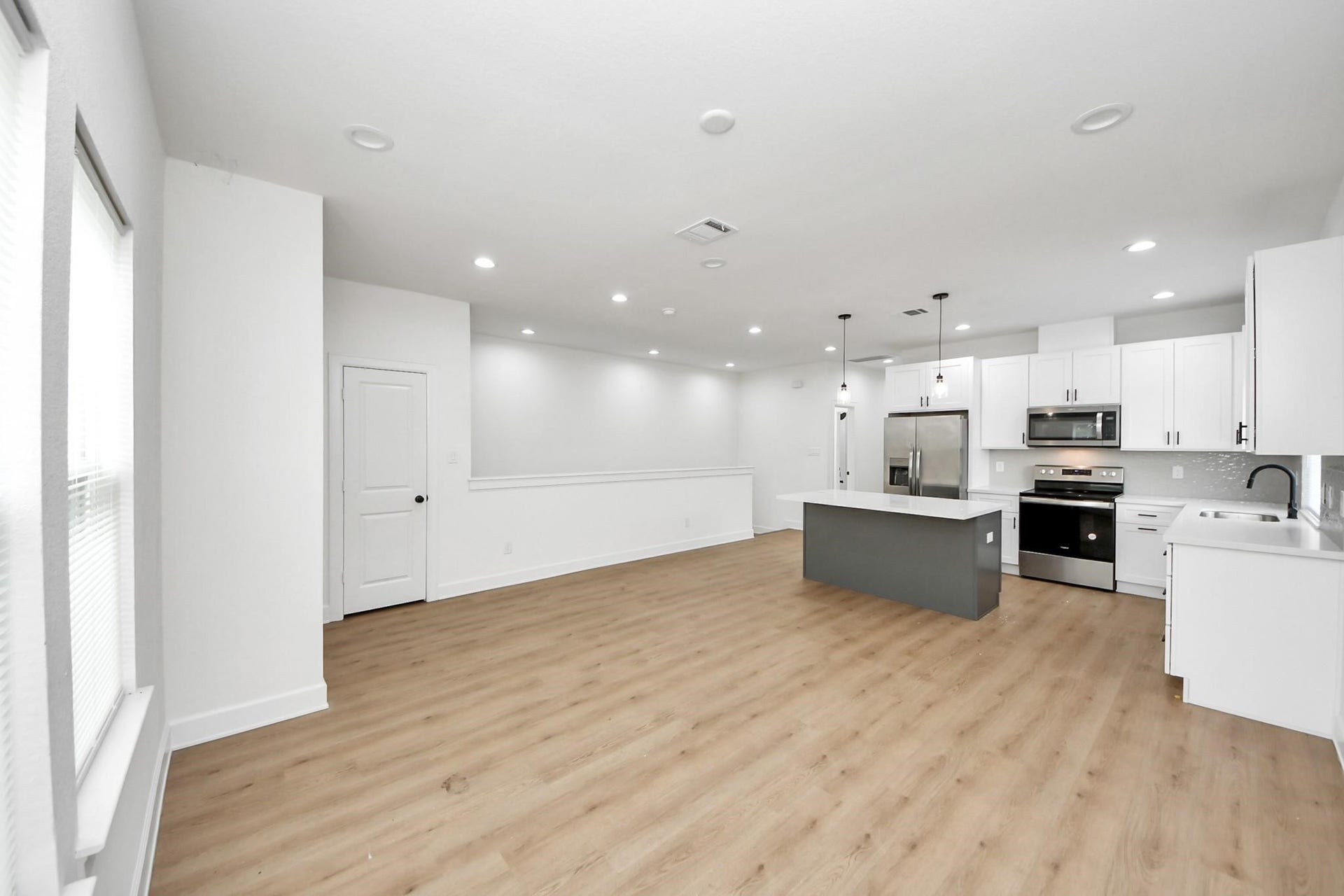 8316 Corinth Street, #c, Houston, TX 77051 Enjoy a true open-concept layout where the living room flows seamlessly into the kitchen and dining space.