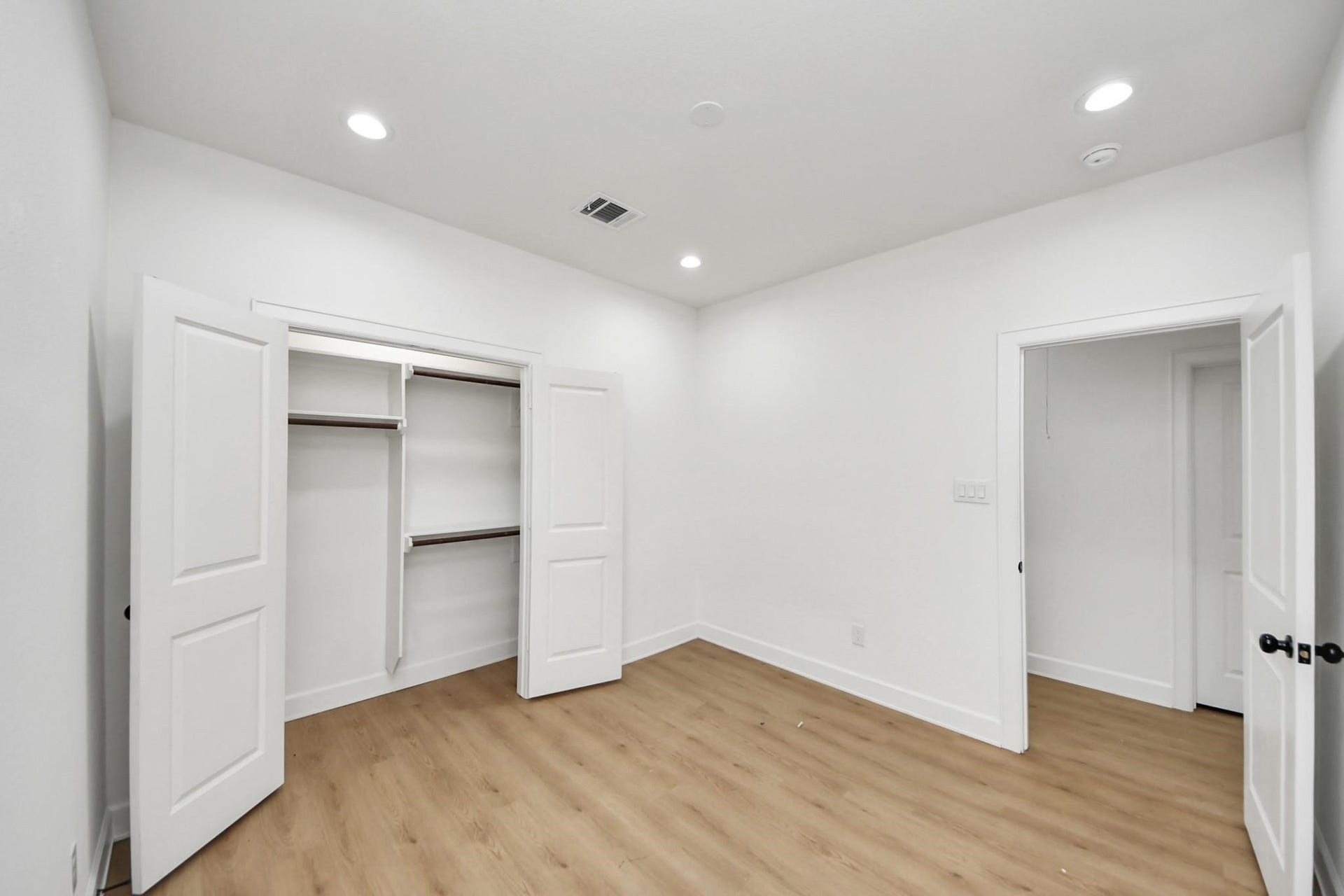 8316 Corinth Street, #c, Houston, TX 77051 Bright and airy, this secondary bedroom features recessed lighting and a large closet with double doors.