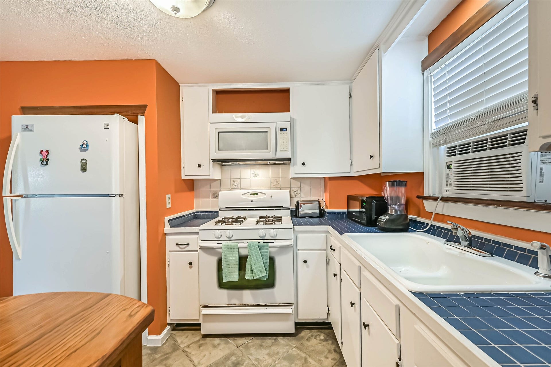 A functional kitchen with ample cabinetry and counter space, ready for everyday cooking and meal preparation.