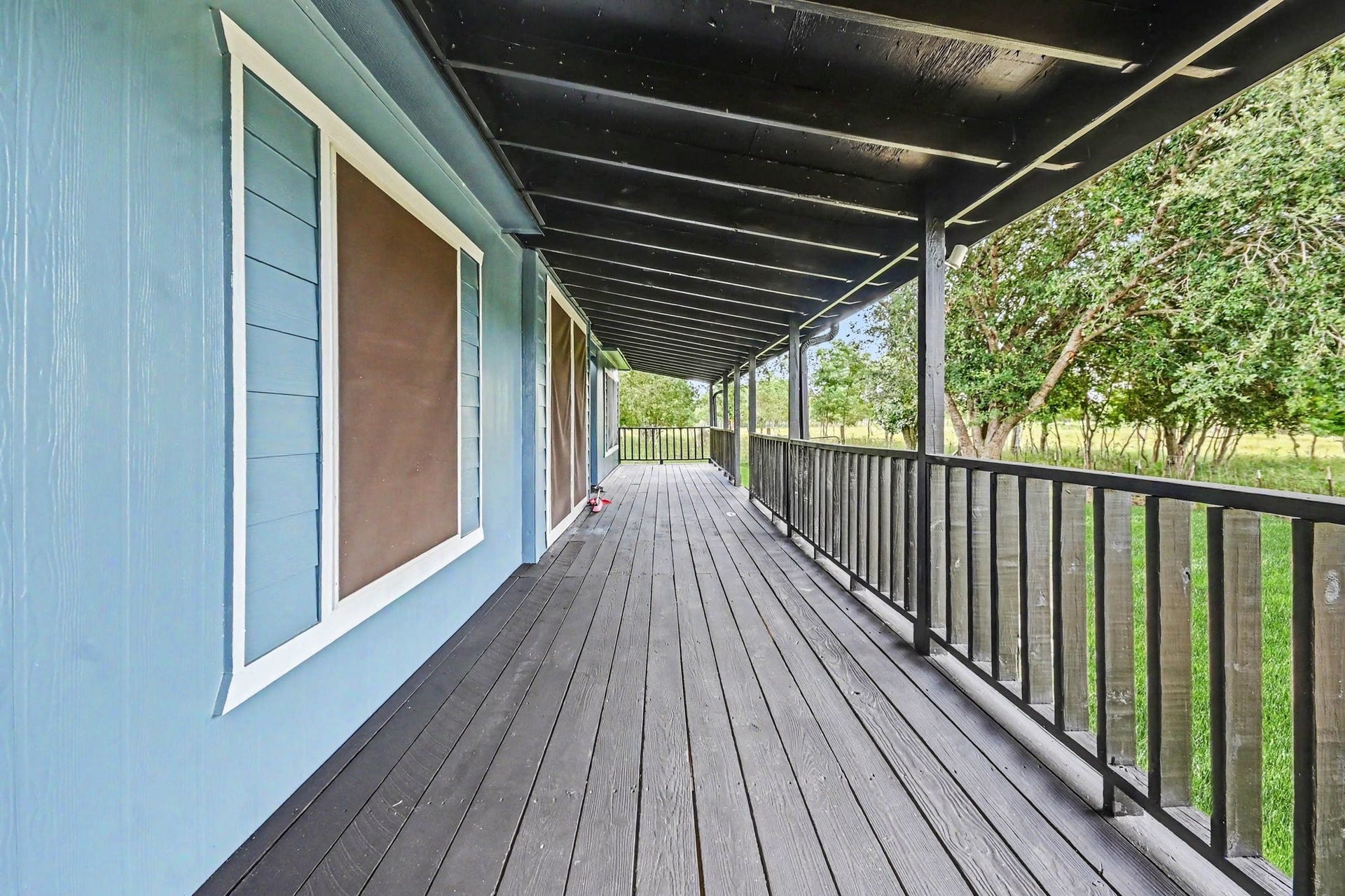 2925 FM 2917, Alvin, TX 77511 Lots of space for porch rockers!