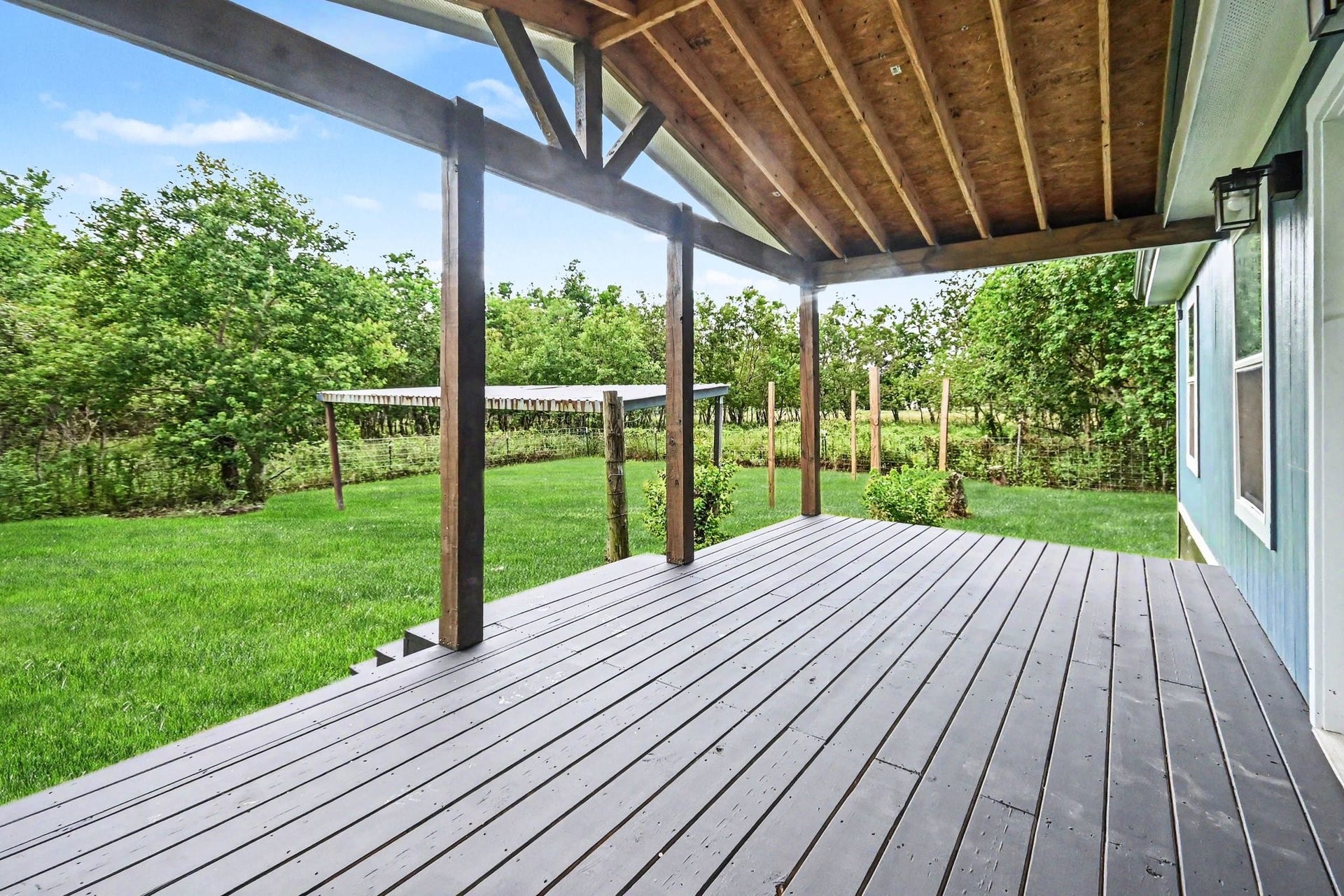 2925 FM 2917, Alvin, TX 77511 Spacious back porch has acreage view