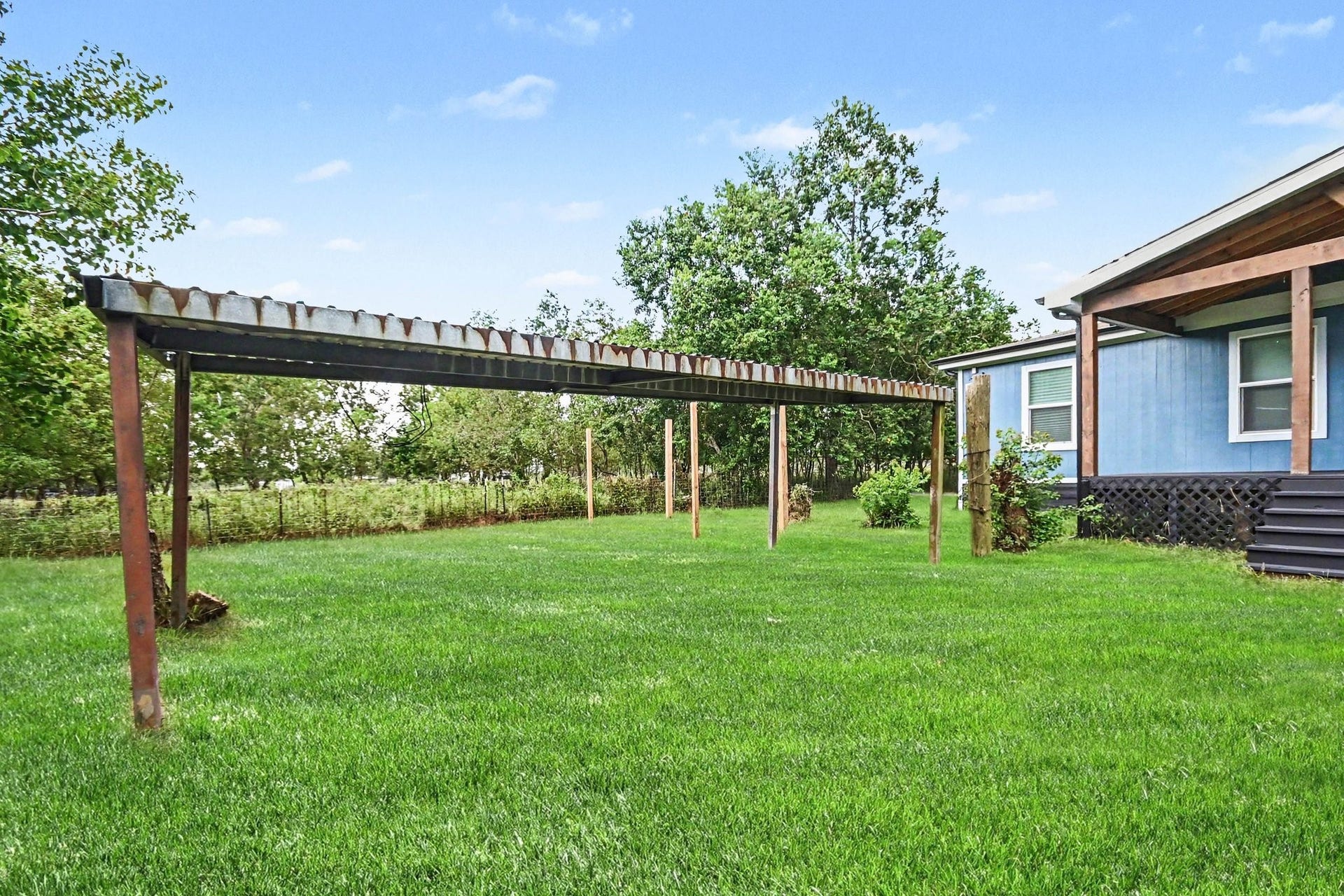 2925 FM 2917, Alvin, TX 77511 Covered patio for animals, tractor, etc.