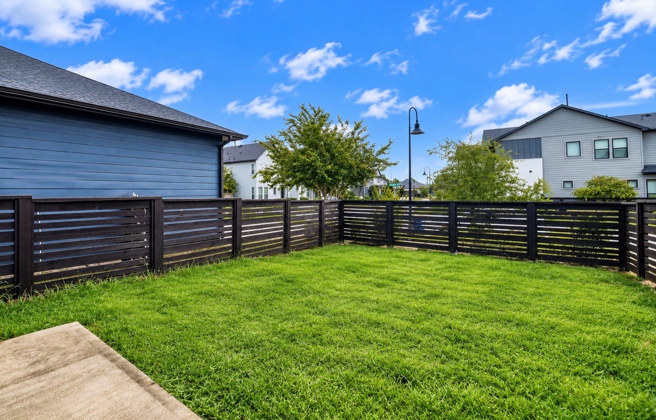15814 Celebration Lane, Cypress, TX 77433 Fully fenced green space creates a private retreat while enjoying the amenities of the Bridgeland lifestyle.