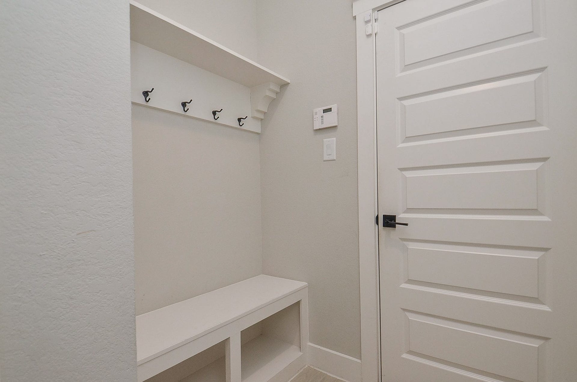 15814 Celebration Lane, Cypress, TX 77433 Built-in drop zone adds practical organization for bags, shoes and daily essentials.
