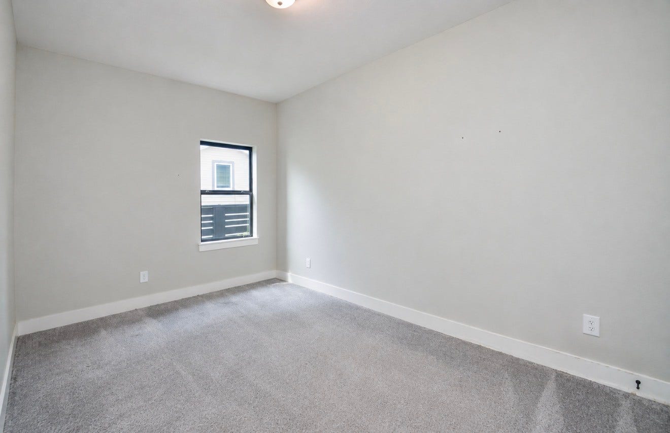 15814 Celebration Lane, Cypress, TX 77433 Comfortable secondary bedroom combines neutral finishes, natural light and flexible dimensions.