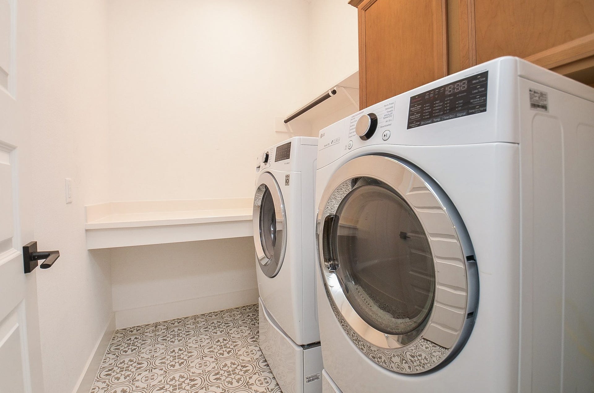 15814 Celebration Lane, Cypress, TX 77433 Dedicated laundry room provides convenient utility space for everyday household needs.