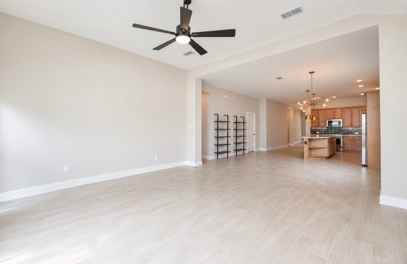 15814 Celebration Lane, Cypress, TX 77433 Wide interior sightlines emphasize the homes connected design and easy movement between spaces.