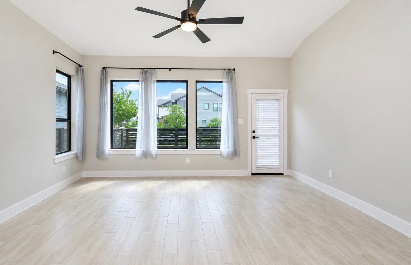15814 Celebration Lane, Cypress, TX 77433 Inviting living space features abundant natural light and an open layout designed for comfortable everyday living.