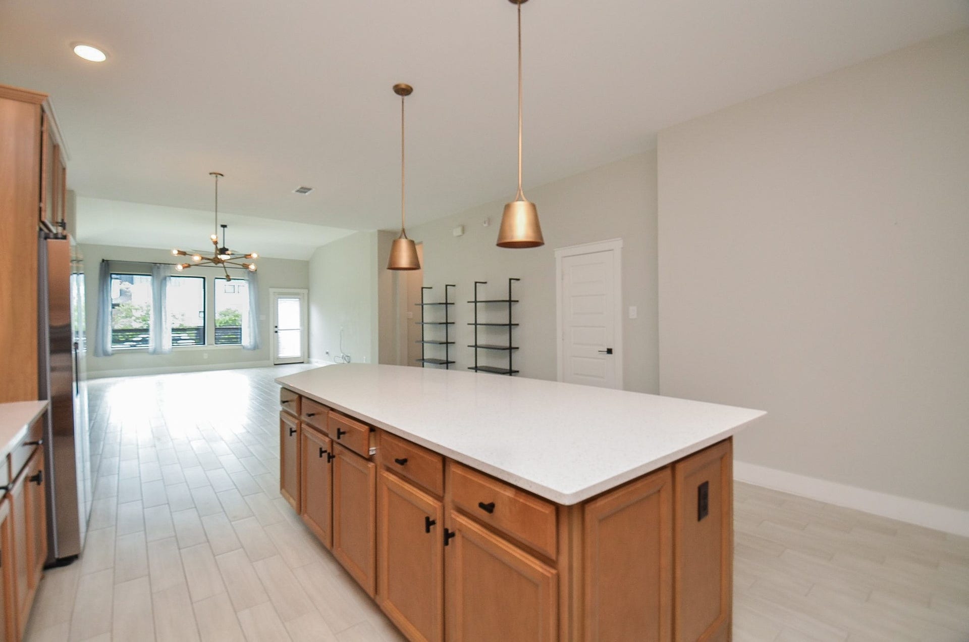 15814 Celebration Lane, Cypress, TX 77433 Additional kitchen perspective highlights plentiful counter space and convenient access to adjoining areas.