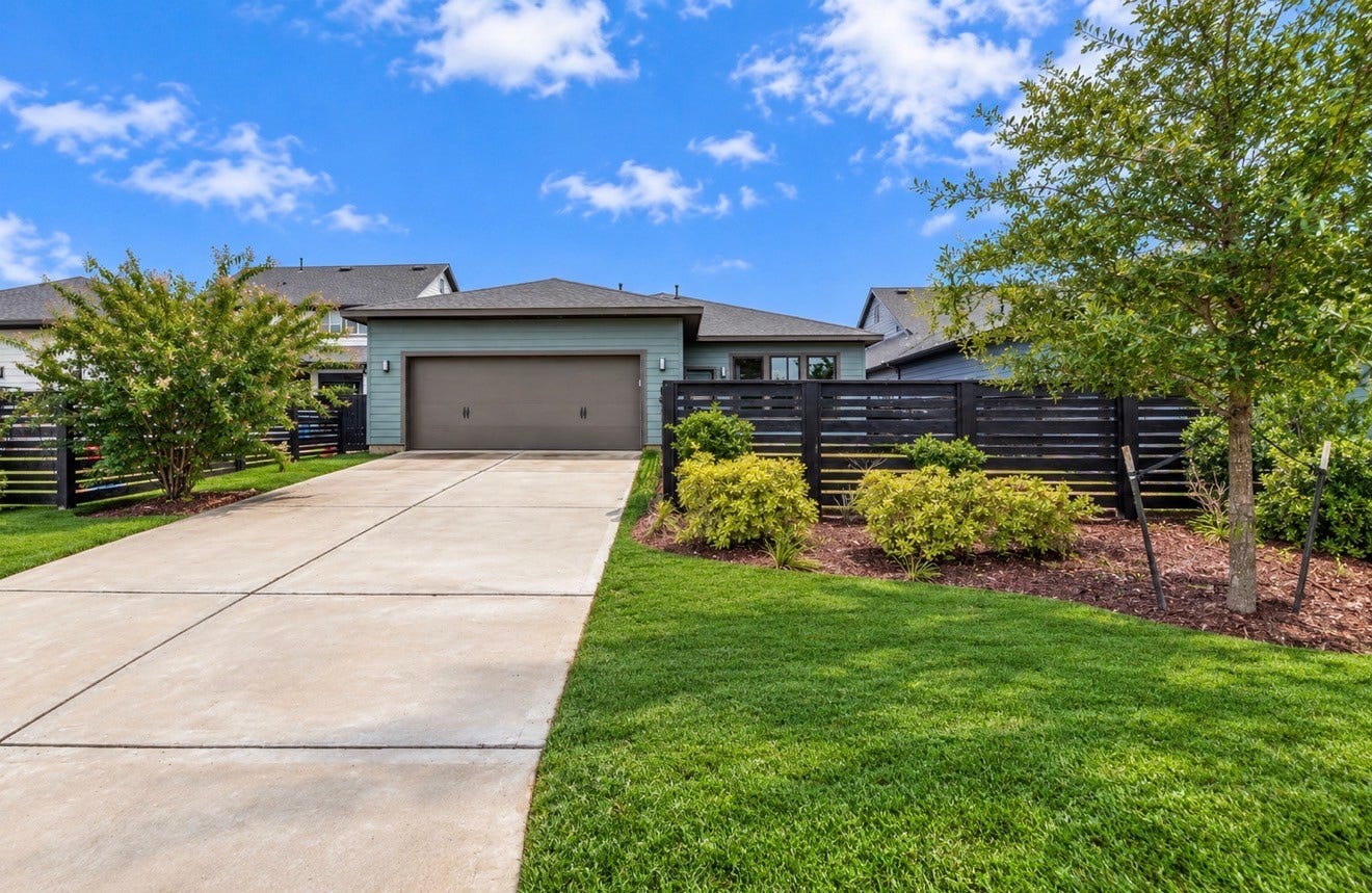 15814 Celebration Lane, Cypress, TX 77433 Rear exterior highlights the generous homesite and exceptional proximity to Celebration Park.