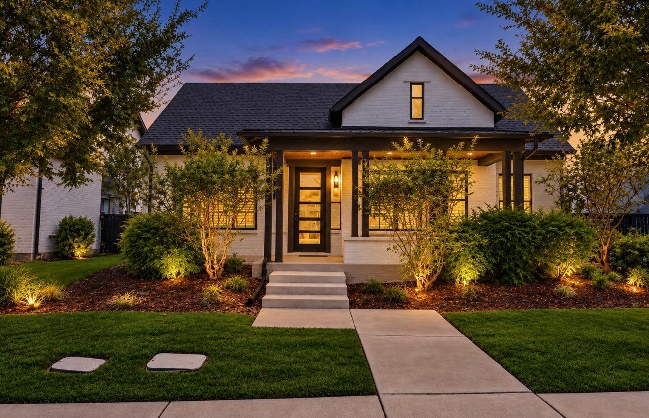 15814 Celebration Lane, Cypress, TX 77433 Twilight view showcases the distinctive architecture of this David Weekley home and its warm evening ambiance.