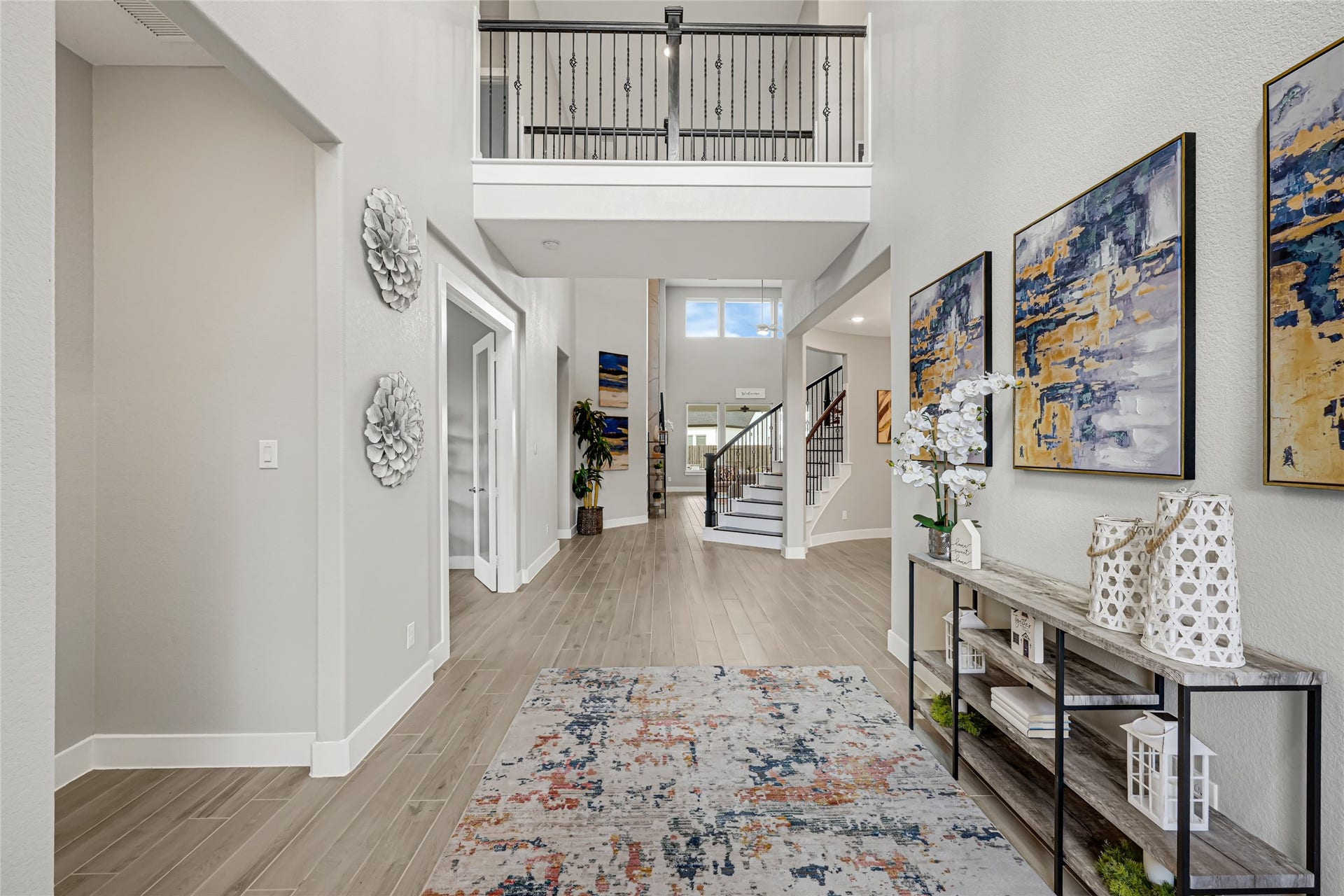 10315 Fountain Shore Drive, Missouri City, TX 77459 Bright family living area with high ceilings and large windows.