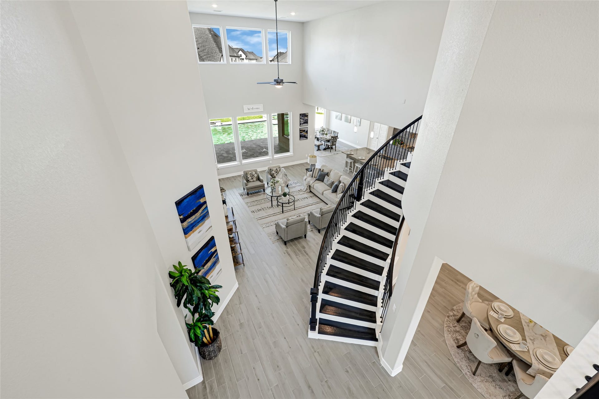 10315 Fountain Shore Drive, Missouri City, TX 77459 Dramatic staircase and foyer view highlighting the home's open design.