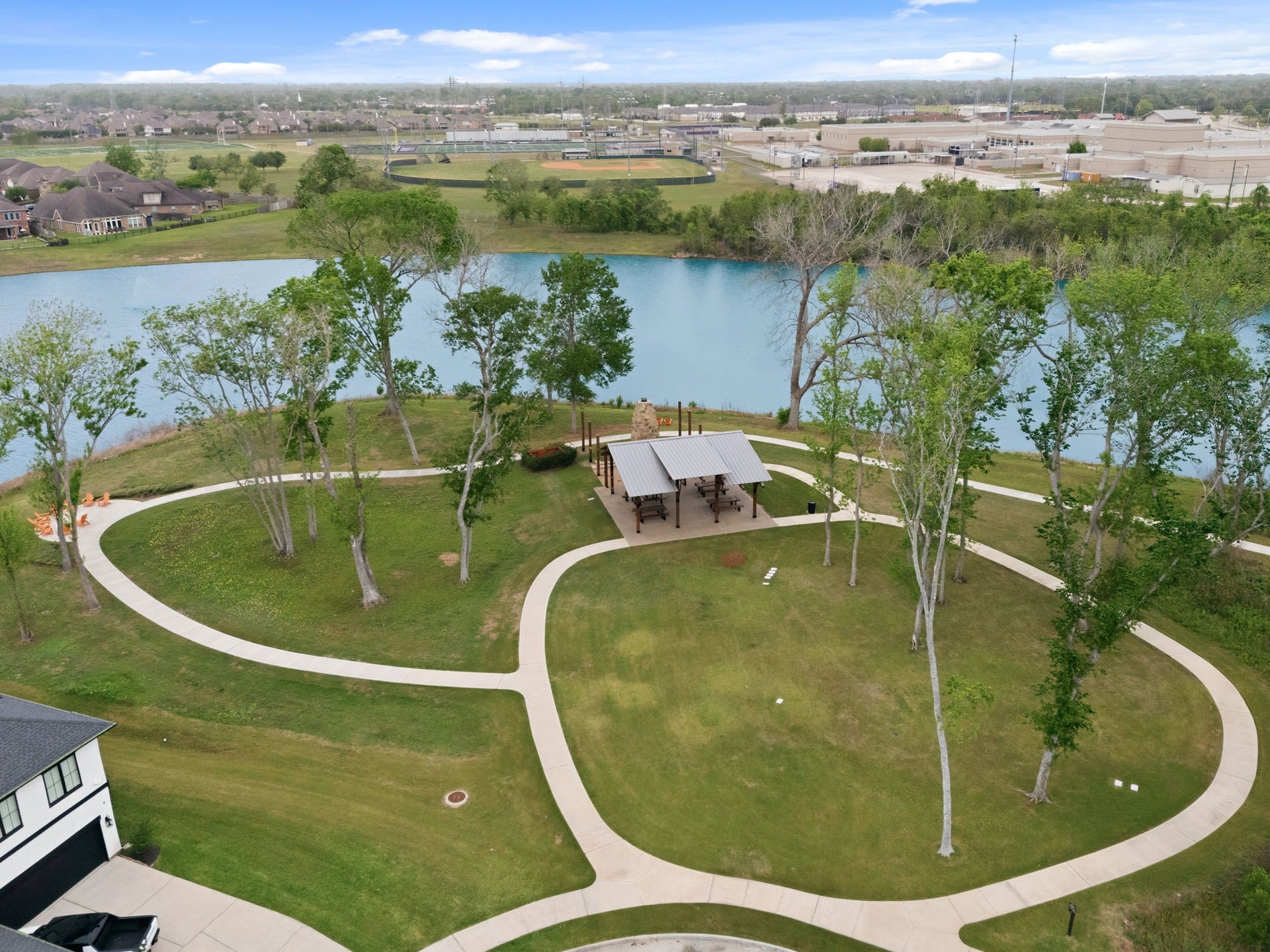 10315 Fountain Shore Drive, Missouri City, TX 77459 Scenic community view showcasing nearby walking trails and green space.