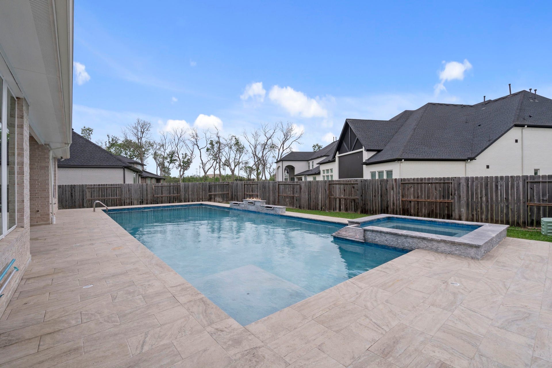 10315 Fountain Shore Drive, Missouri City, TX 77459 Resort-style pool with spacious deck and outdoor entertaining space.