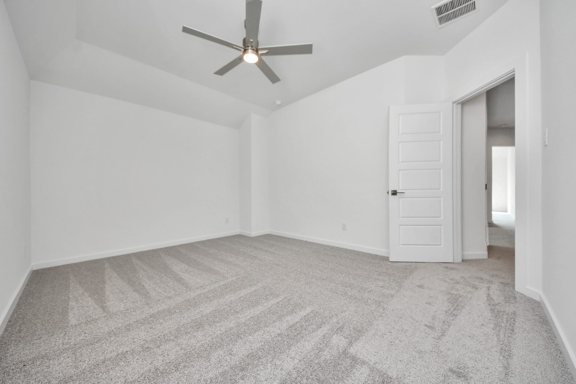 Generously sized secondary bedrooms featuring spacious closets, soft and inviting carpeting underfoot, large windows allowing plenty of natural light, and the added touch of privacy blinds for your personal retreat.
