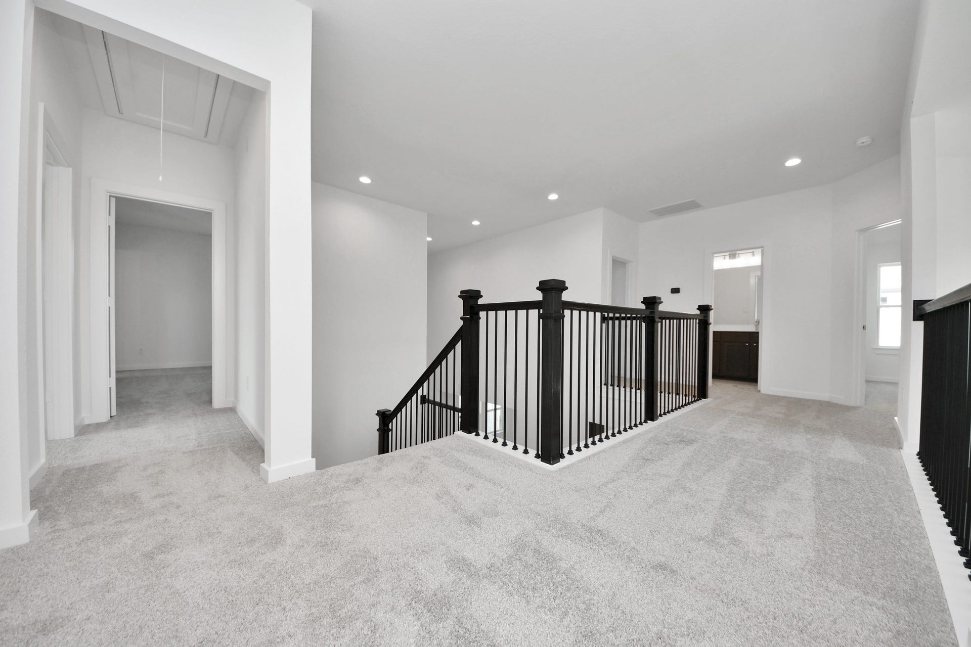 Come upstairs and enjoy a day of leisure in this fabulous game room! This is the perfect hangout spot or adult game room! Features plush carpet, high ceilings, custom paint and windows for plenty of natural light.