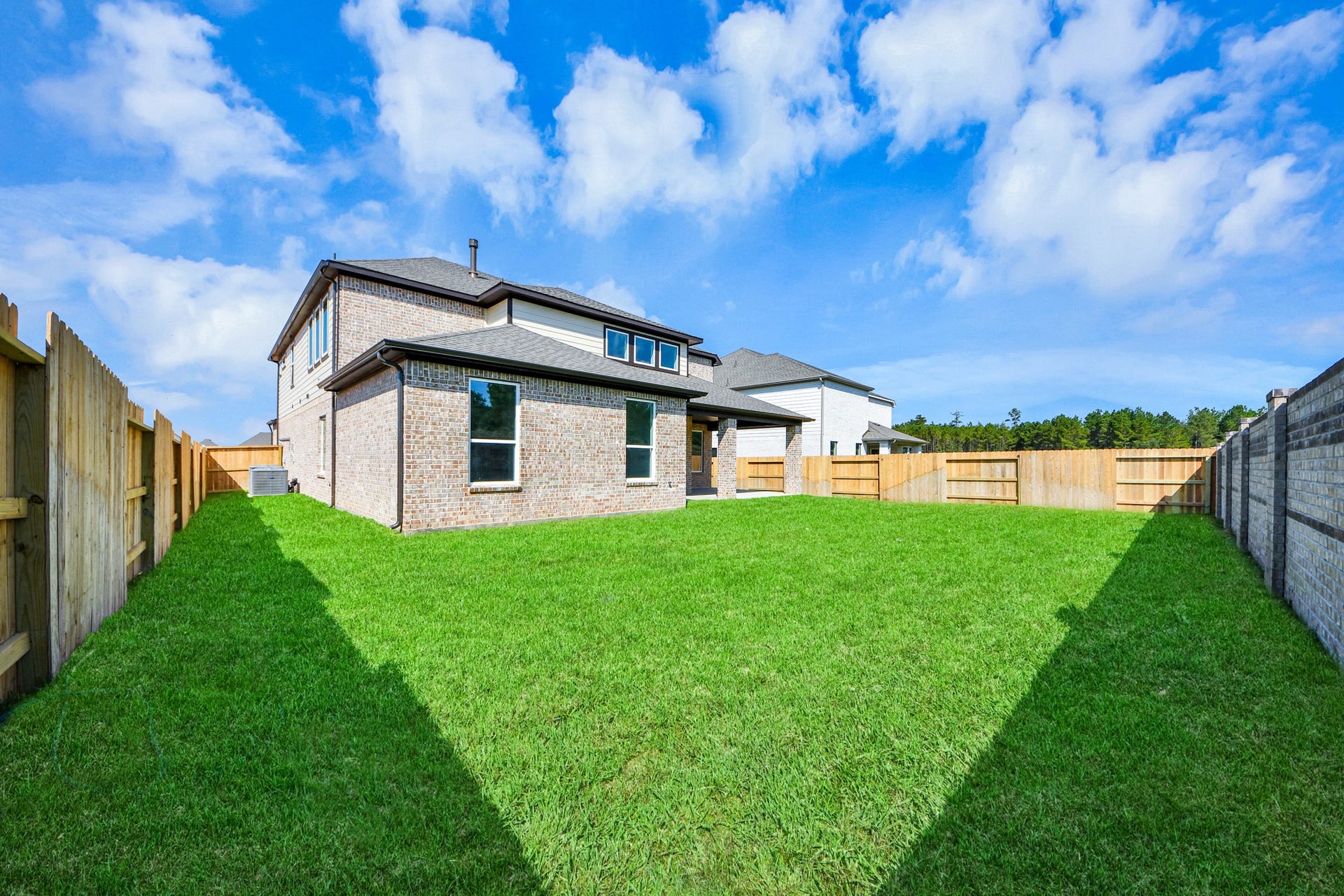 Explore the expansive backyard with its inviting covered patioa perfect blend of space for the kids to play and adults to unwind. Ideal for creating your outdoor oasis, this backyard accommodates patio furniture, a BBQ pit, and endless possibilities for leisure and entertainment.
