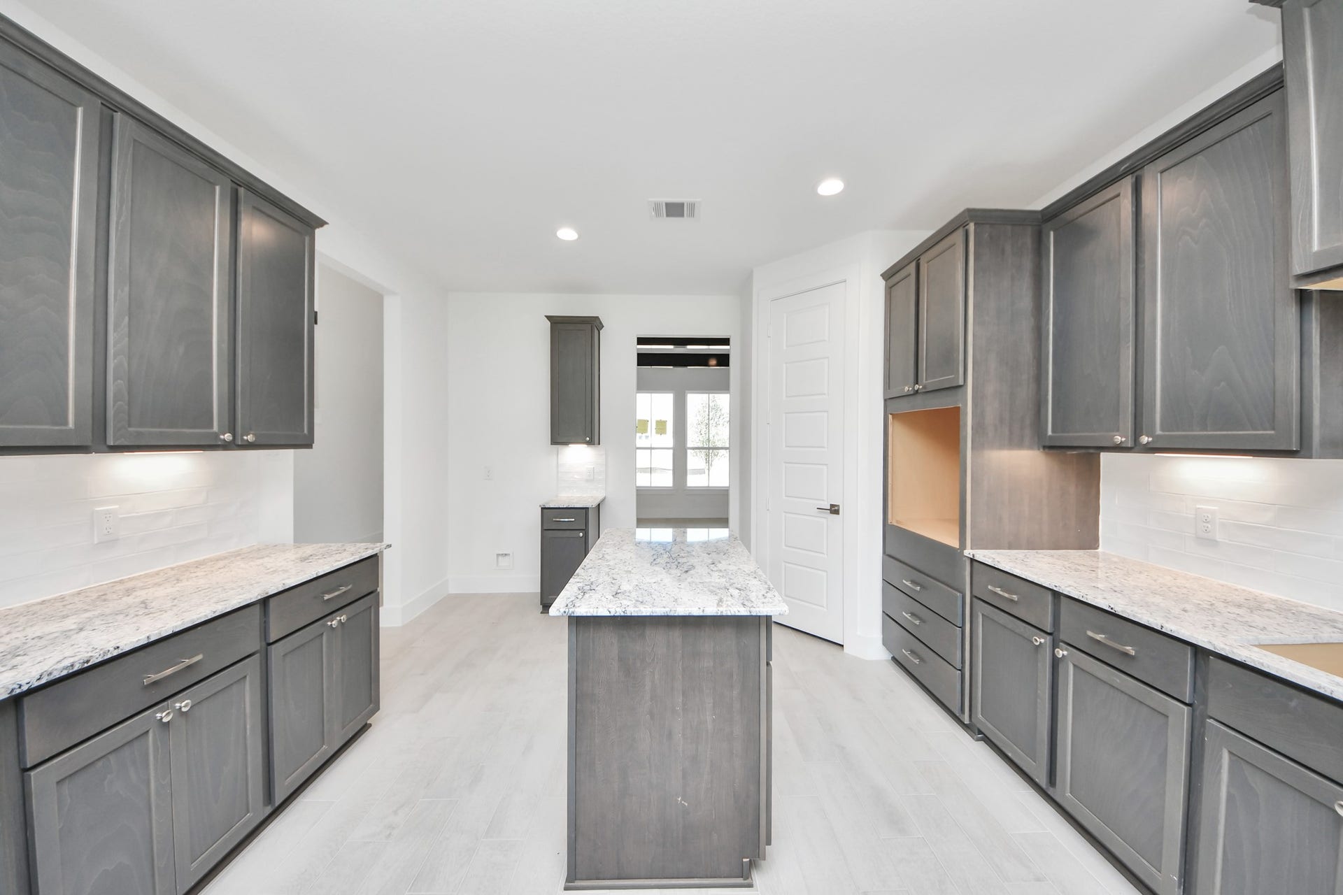 This generously spacious kitchen is a dream realized!
