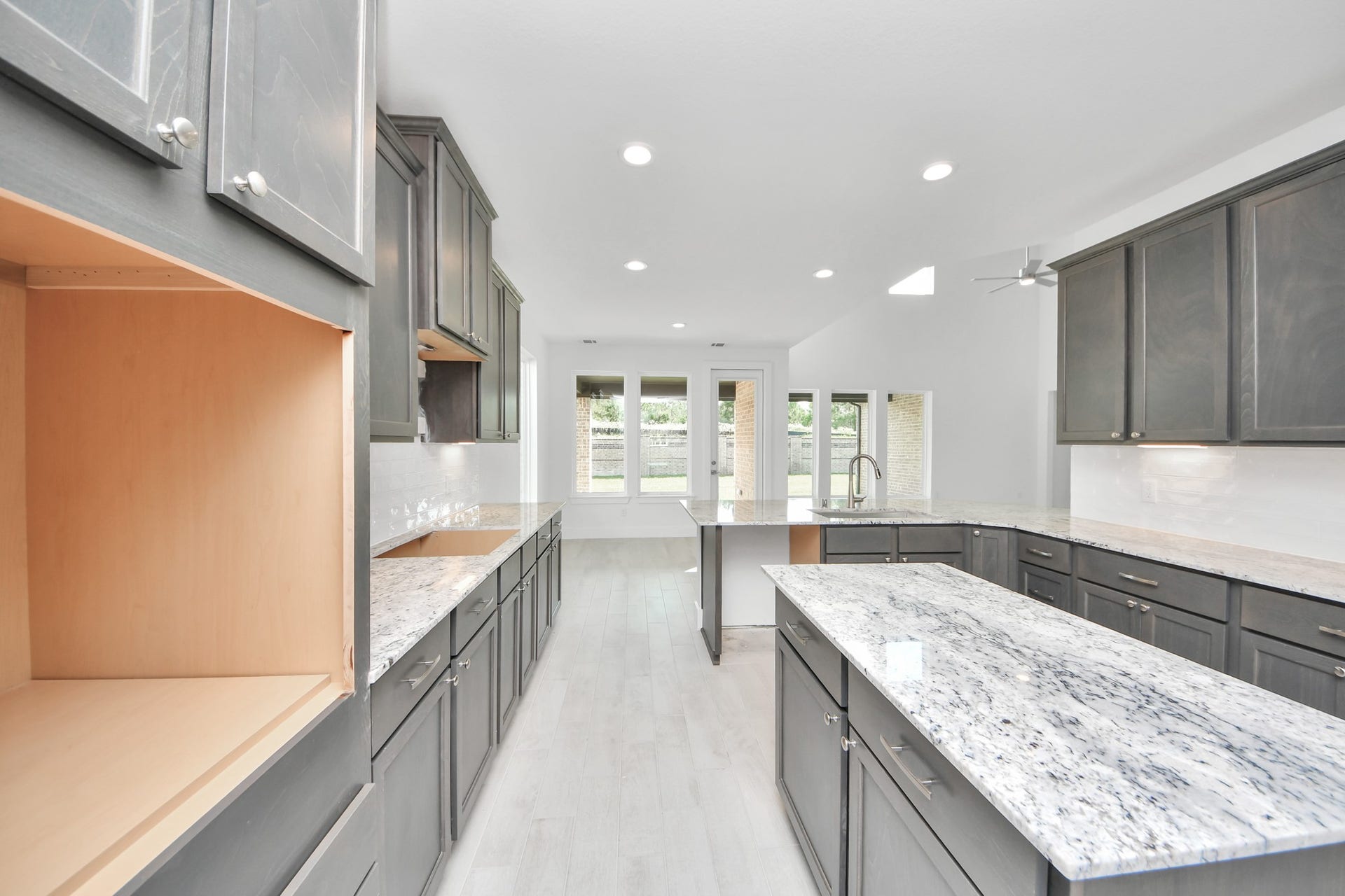 The extended counter area adds both practicality and style, making meal preparation a breeze. Every detail is thoughtfully designed to enhance the kitchen's functionality and aesthetic appeal.