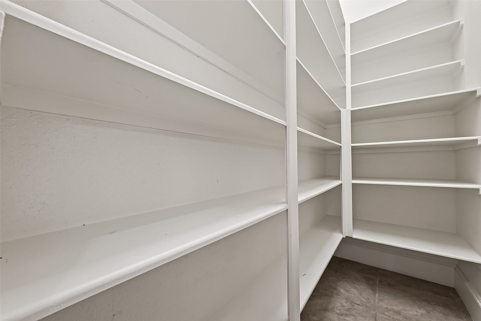 4011 Westerdale Drive, Fulshear, TX 77441 No kitchen is complete without a pantry. In the case of this home, the oversized pantry adds the conveinence of extra space for mini appliances.