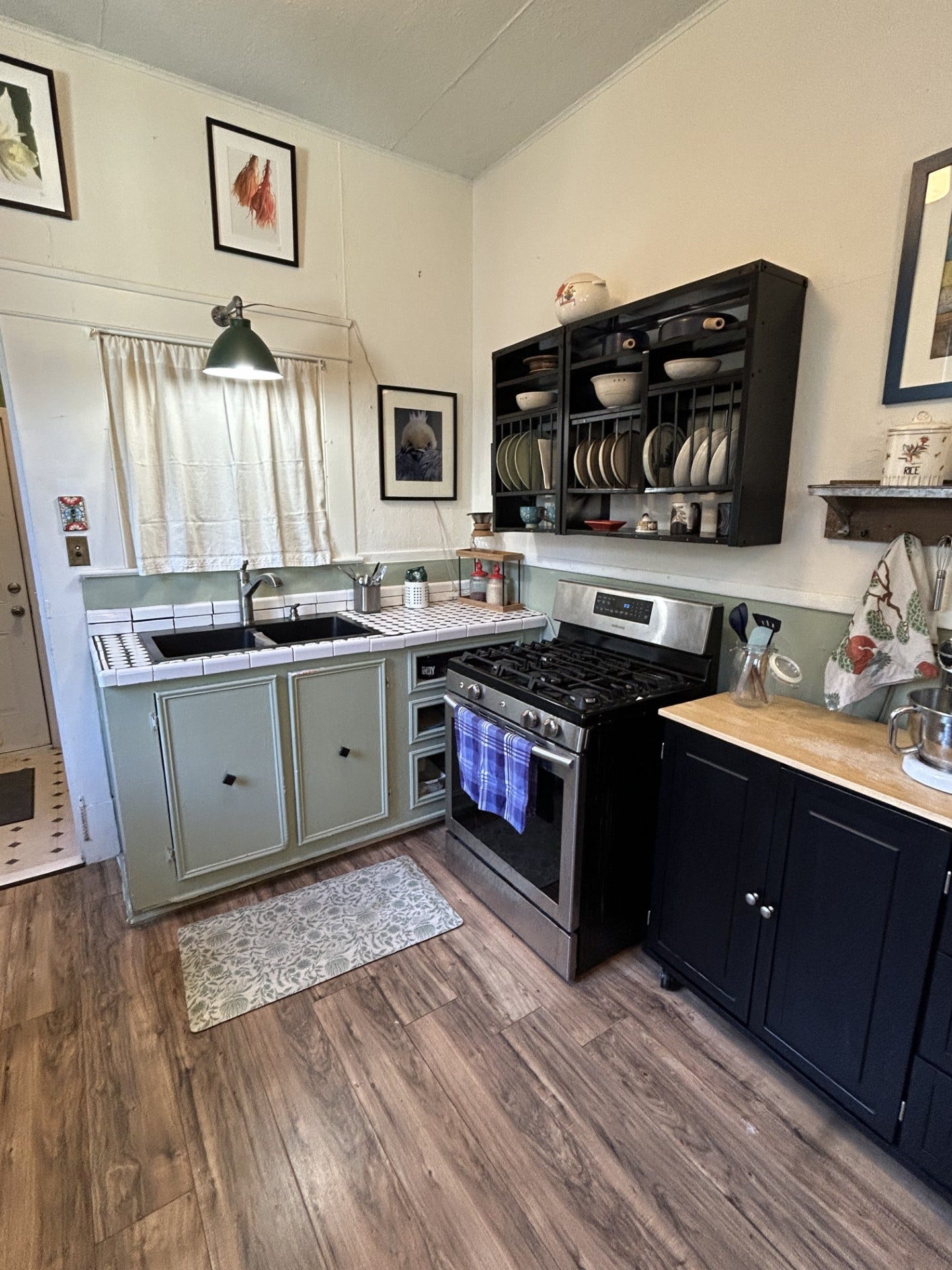3911 Bernardo De Galvez Avenue, Galveston, TX 77550 Gas range and double sink.