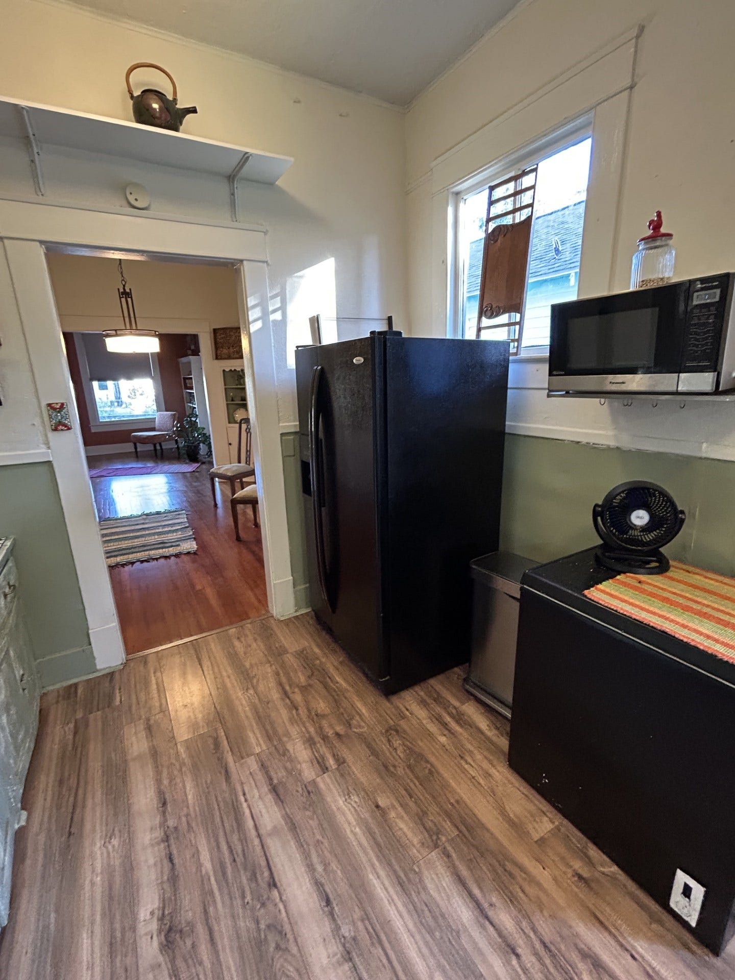3911 Bernardo De Galvez Avenue, Galveston, TX 77550 Kitchen with freezer on the right and refrigerator next to the left.