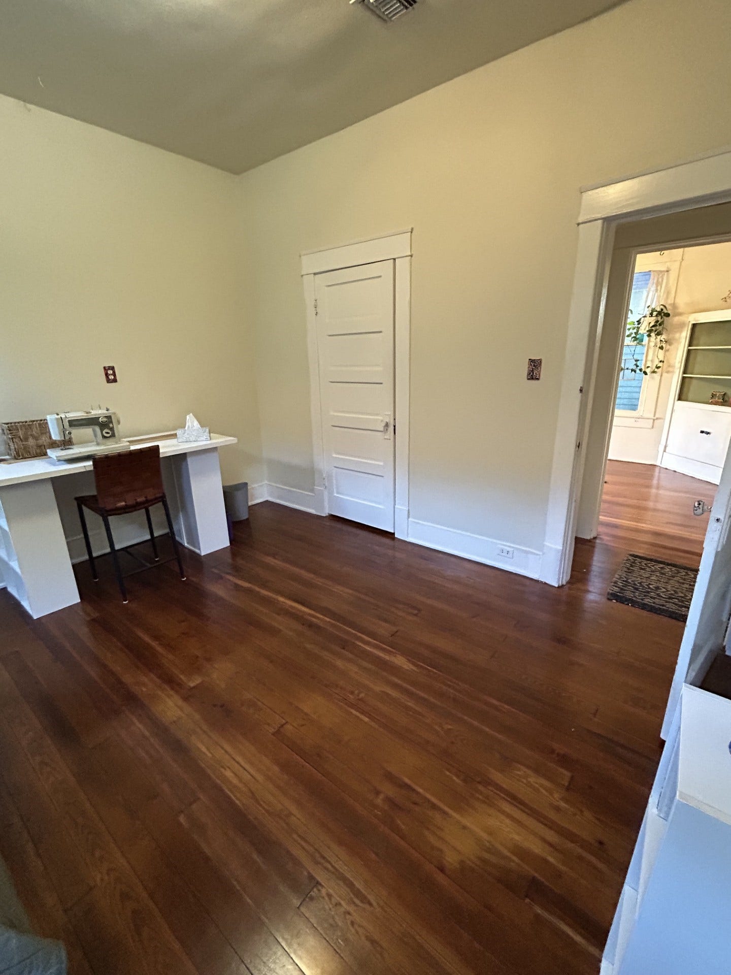 3911 Bernardo De Galvez Avenue, Galveston, TX 77550 Middle bedroom with view from bedroom door across the hallway into the dining room.