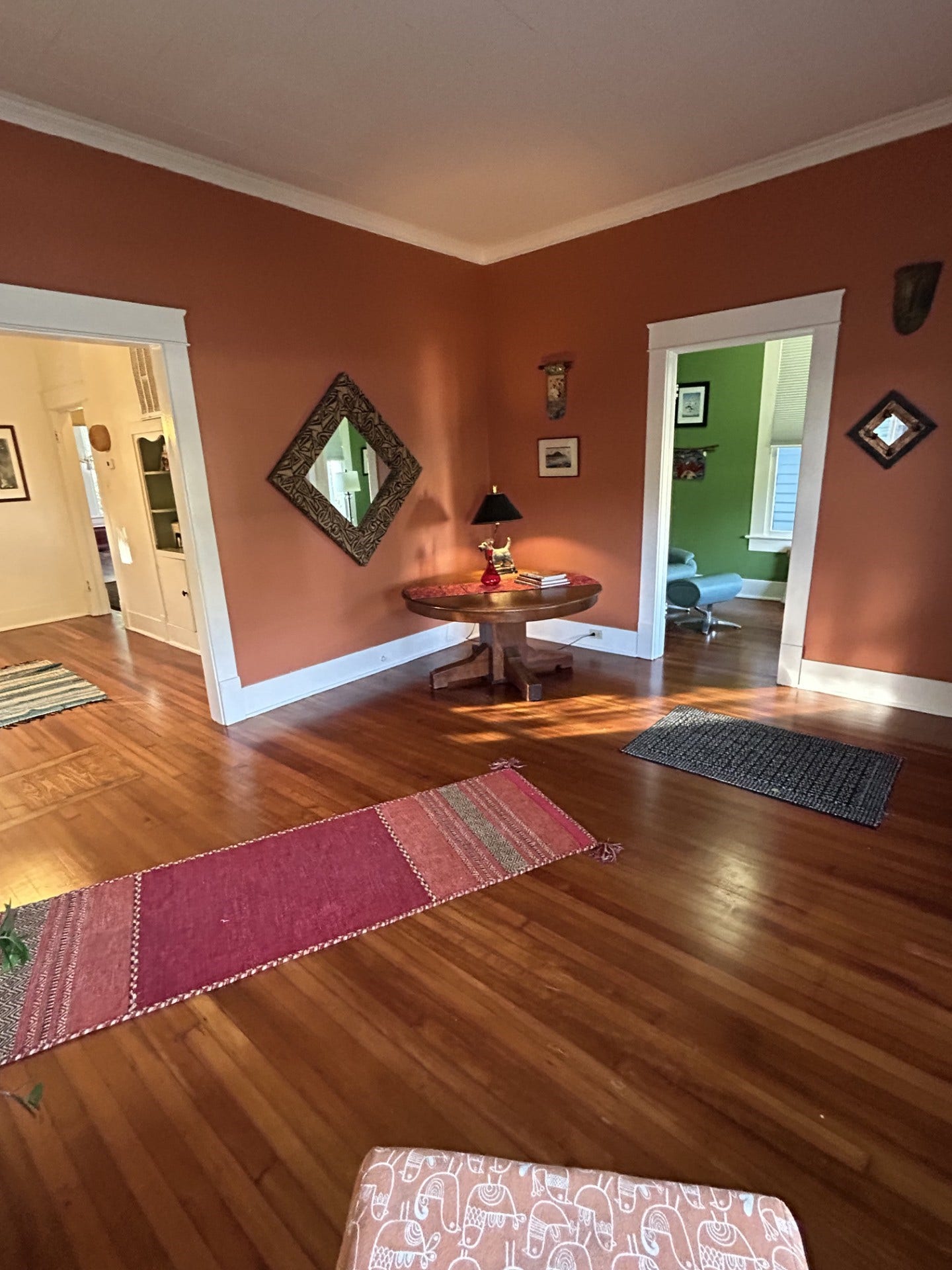 3911 Bernardo De Galvez Avenue, Galveston, TX 77550 Living view with home office/study to the right and formal dining room to the left.