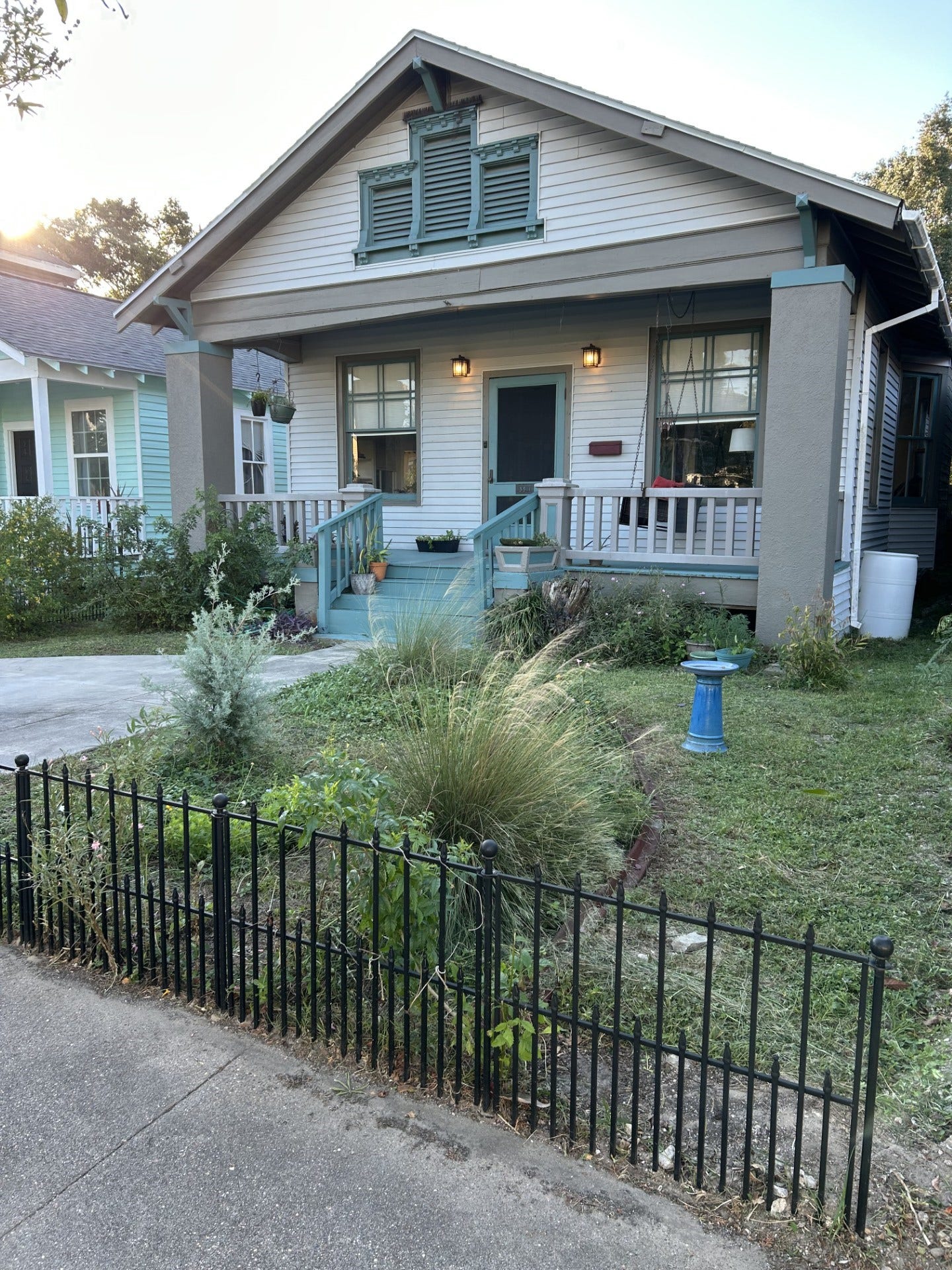 3911 Bernardo De Galvez Avenue, Galveston, TX 77550 Circa 1923 craftsman-style home with wide front porch. Owner had private driveway installed in front yard.